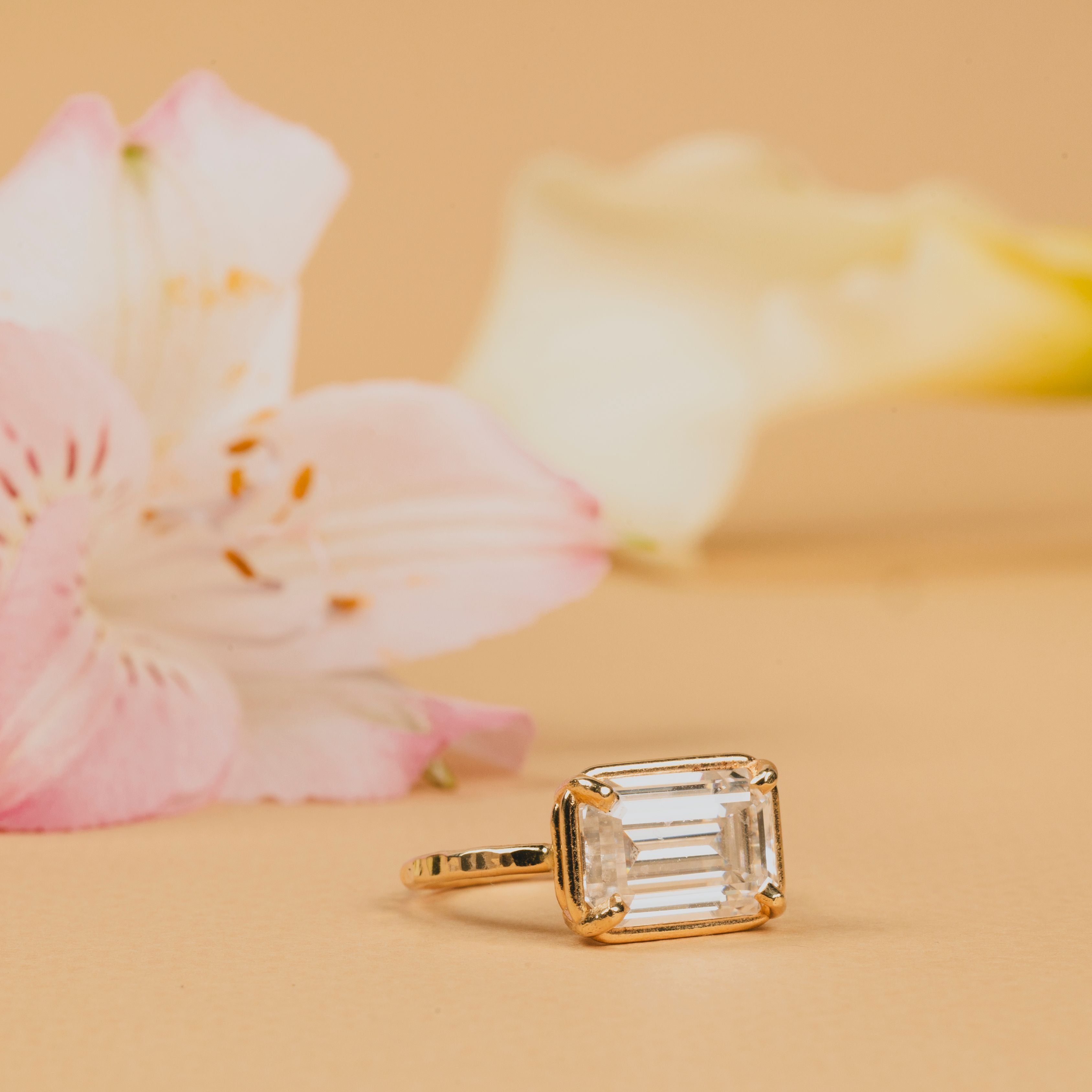 Elongated Hexagon vs. Emerald Cut Engagement Rings - What They Really Look Like on the Hand - MTD