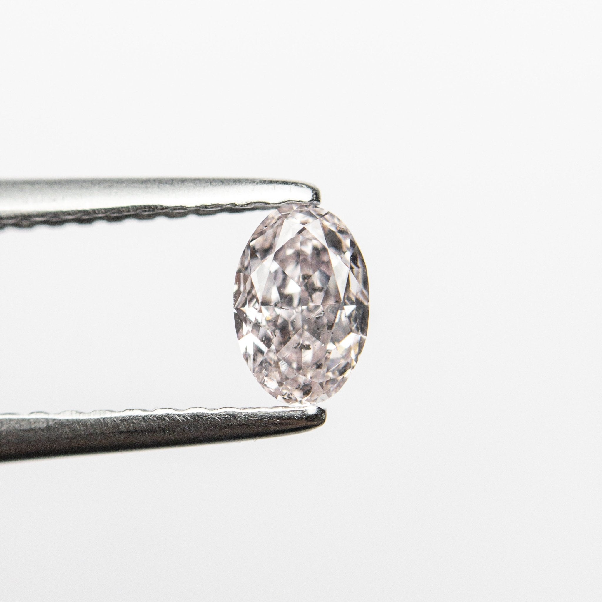 0.40ct 5.38x3.60x2.59mm GIA I1 Fancy Light Pink Oval Brilliant 24094 - 01 - MTD