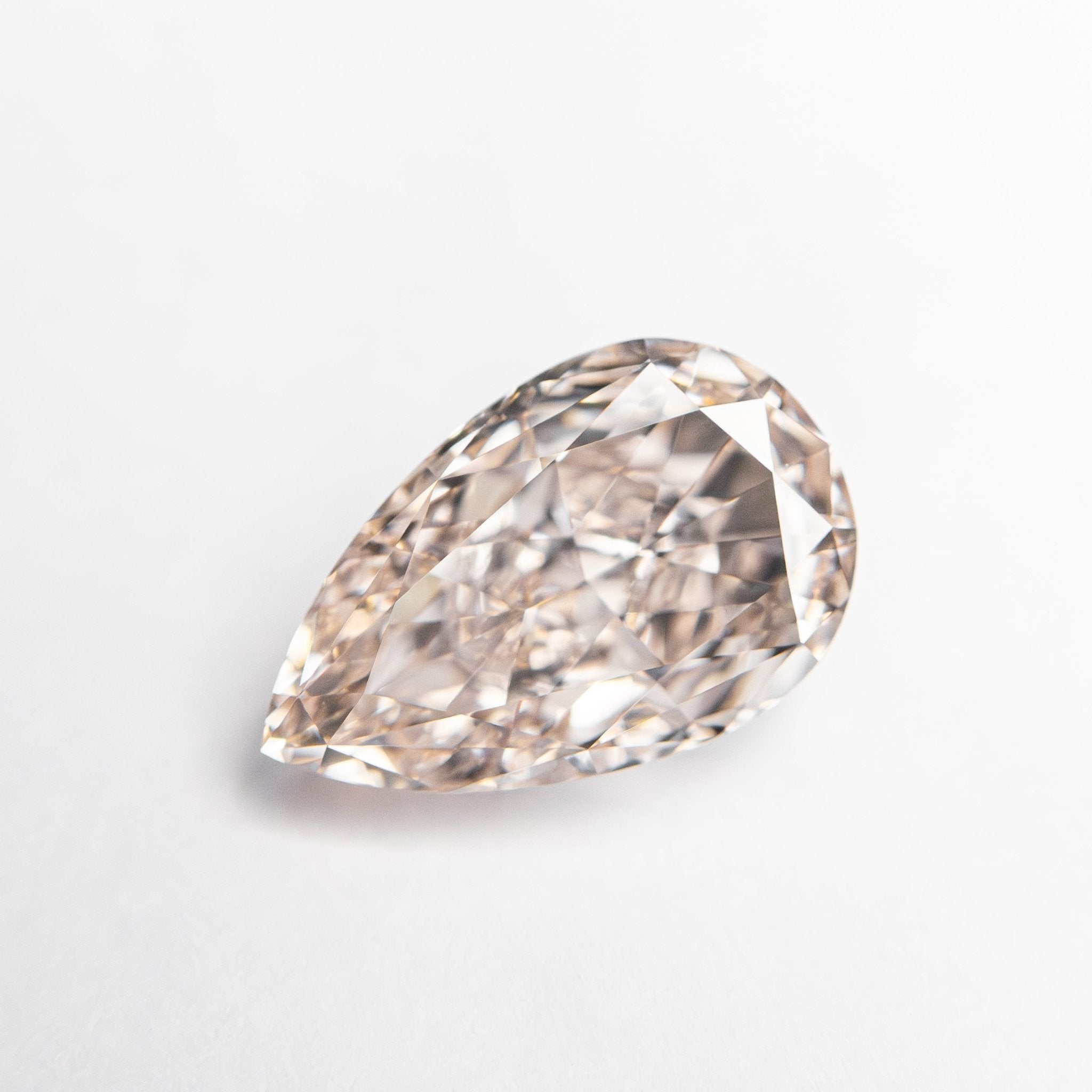 1.61ct 9.36x5.89x3.89mm GIA Internally Flawless Fancy Light Brownish Pink Pear Brilliant 24160-01 - MTD