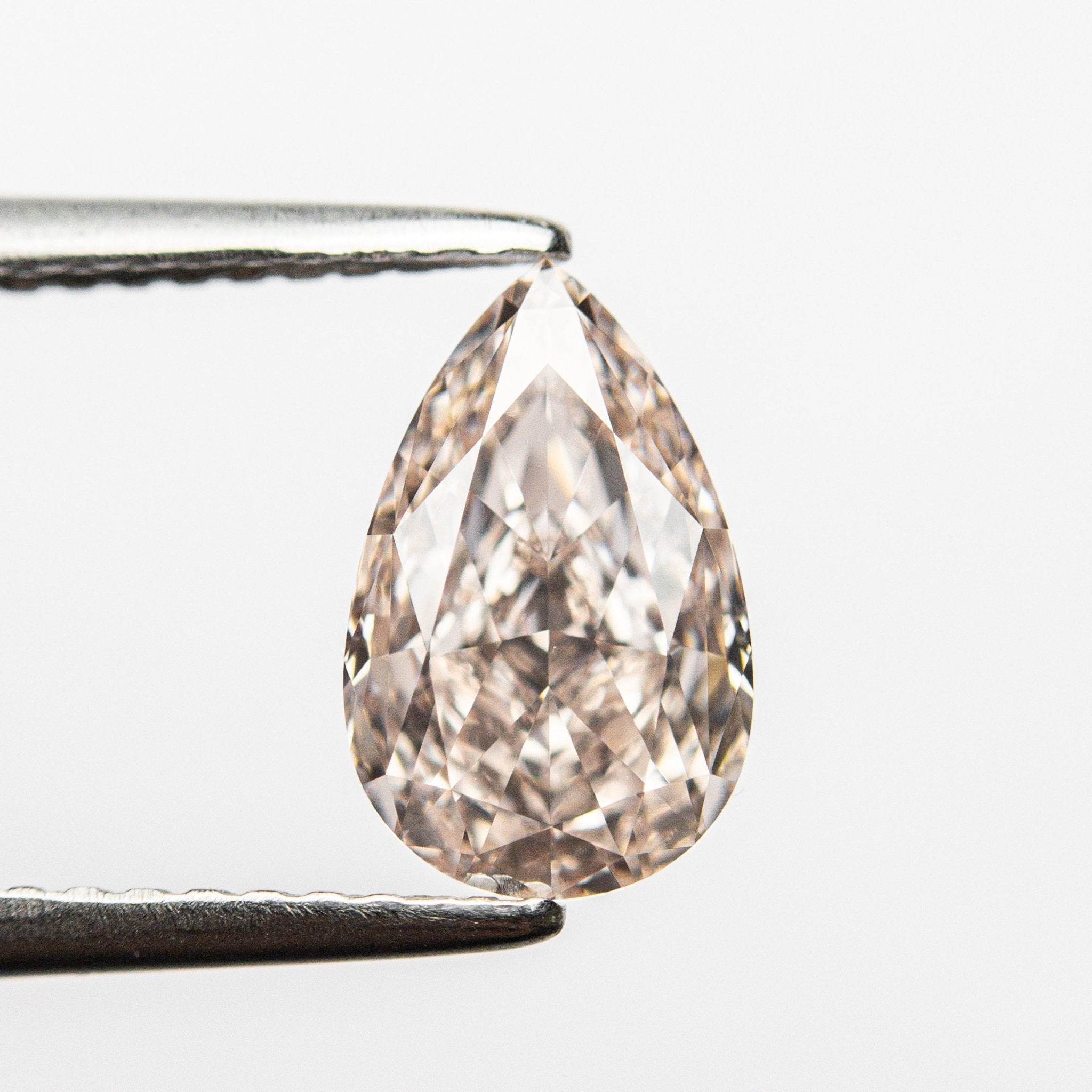 1.61ct 9.36x5.89x3.89mm GIA Internally Flawless Fancy Light Brownish Pink Pear Brilliant 24160-01 - MTD