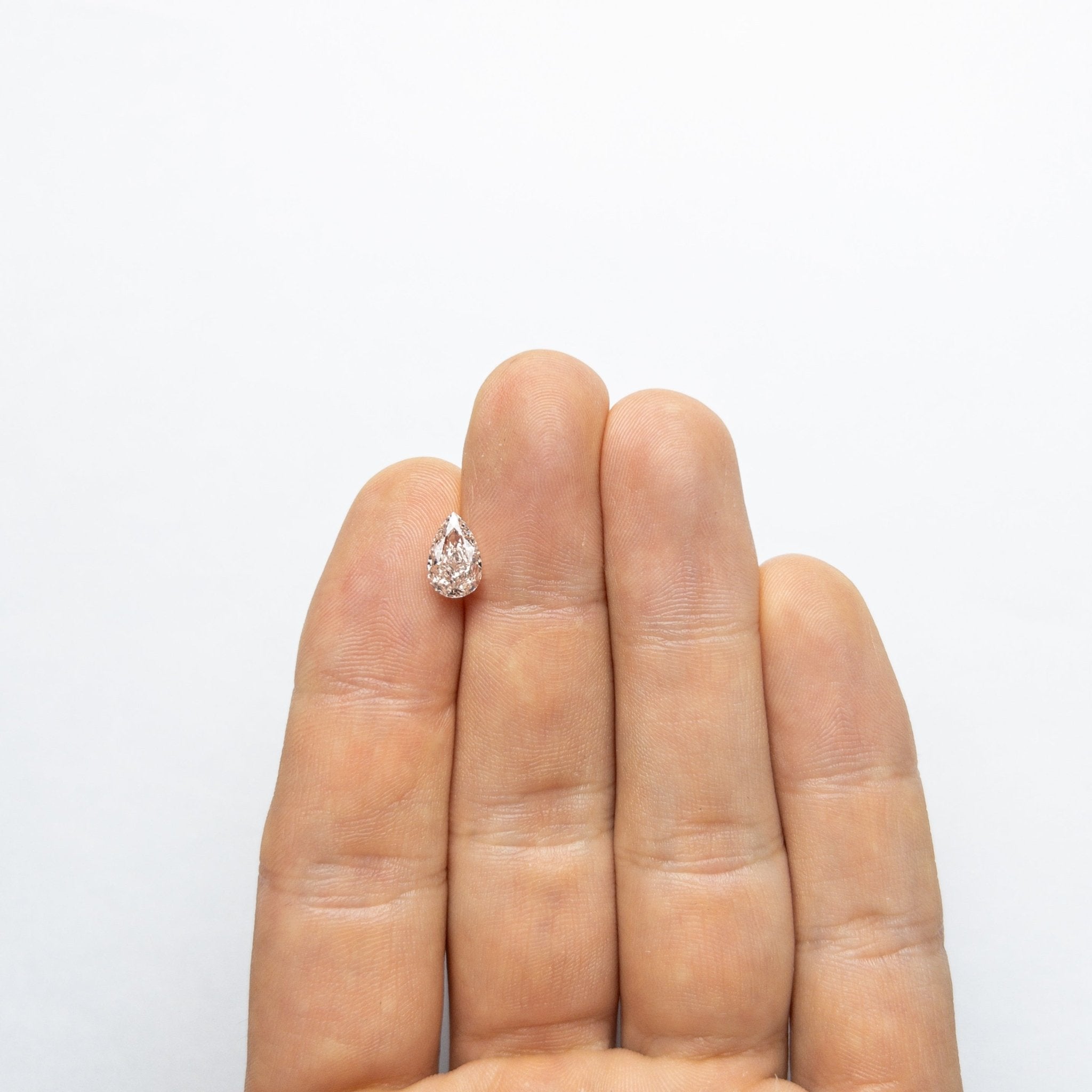 1.61ct 9.36x5.89x3.89mm GIA Internally Flawless Fancy Light Brownish Pink Pear Brilliant 24160-01 - MTD