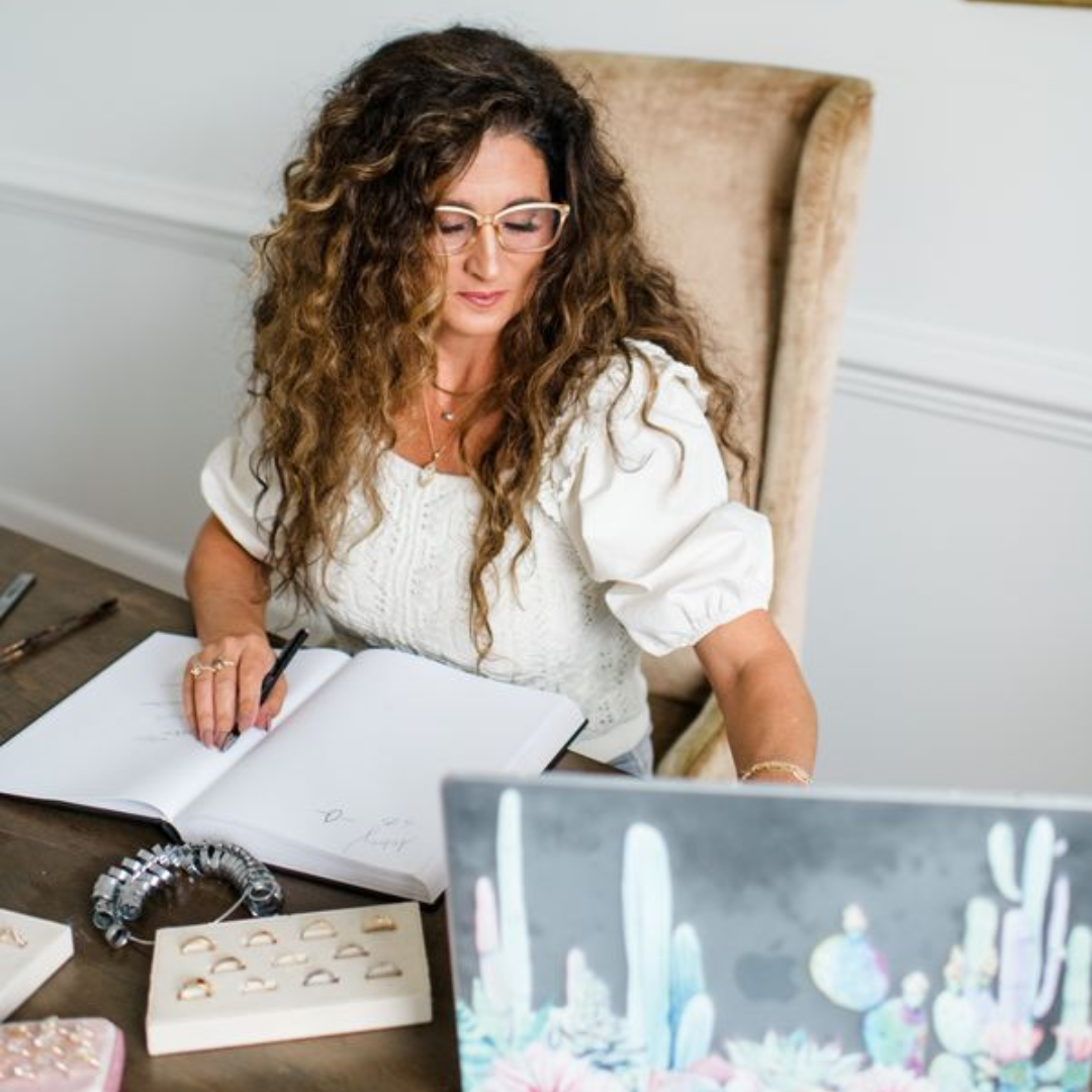 melissa on her computer designing ring