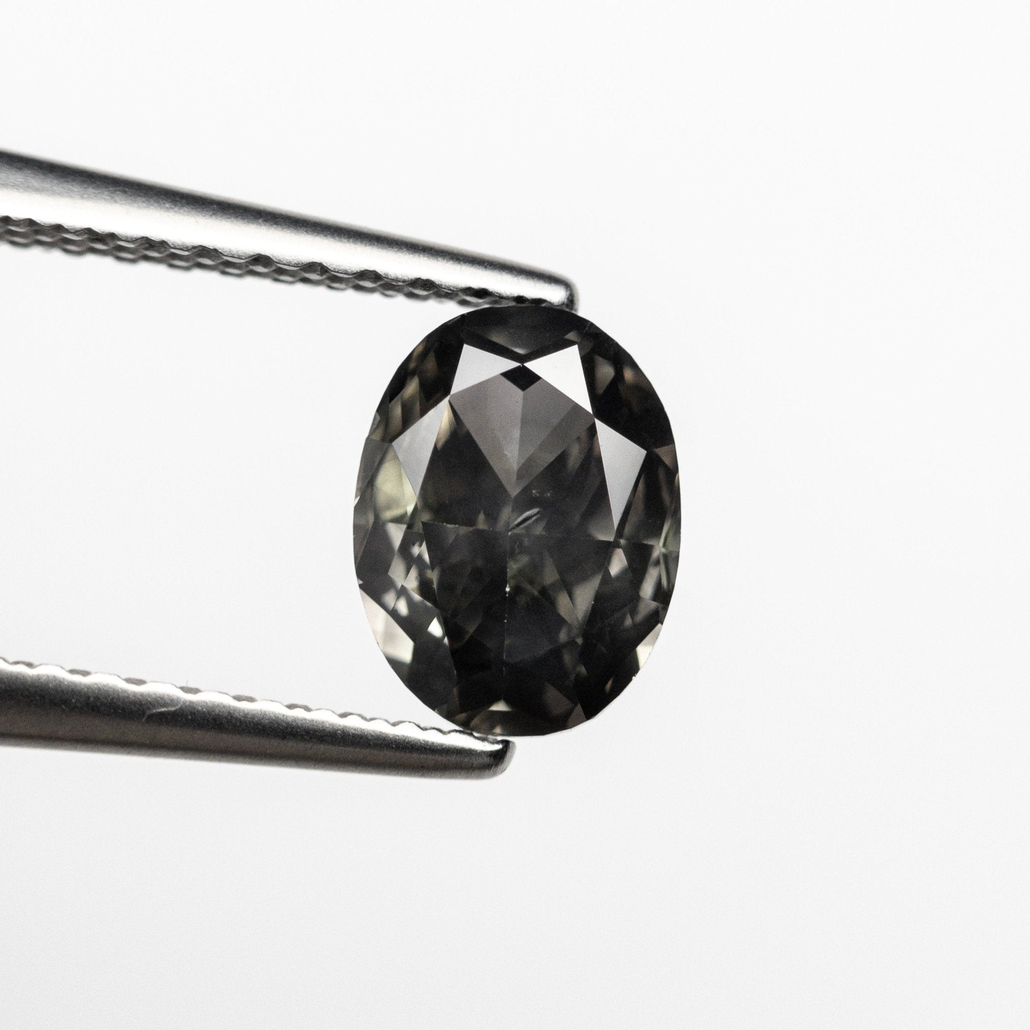 0.77ct 6.75x5.10x2.78mm SI1 Fancy Dark Grey Oval Brilliant 22713 - 01 - MTD