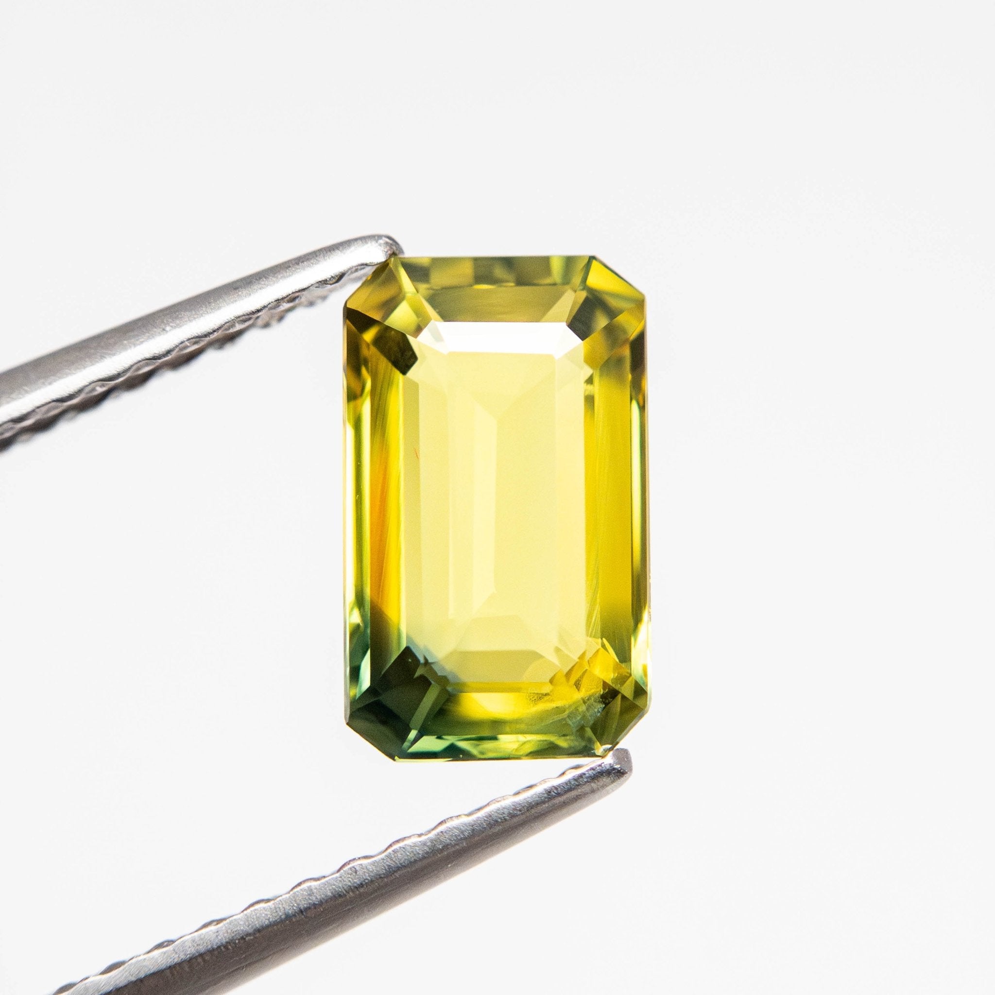 1.56ct 8.53x5.14x3.06mm Cut Corner Rectangle Step Cut Sapphire 23803-09 - MTD
