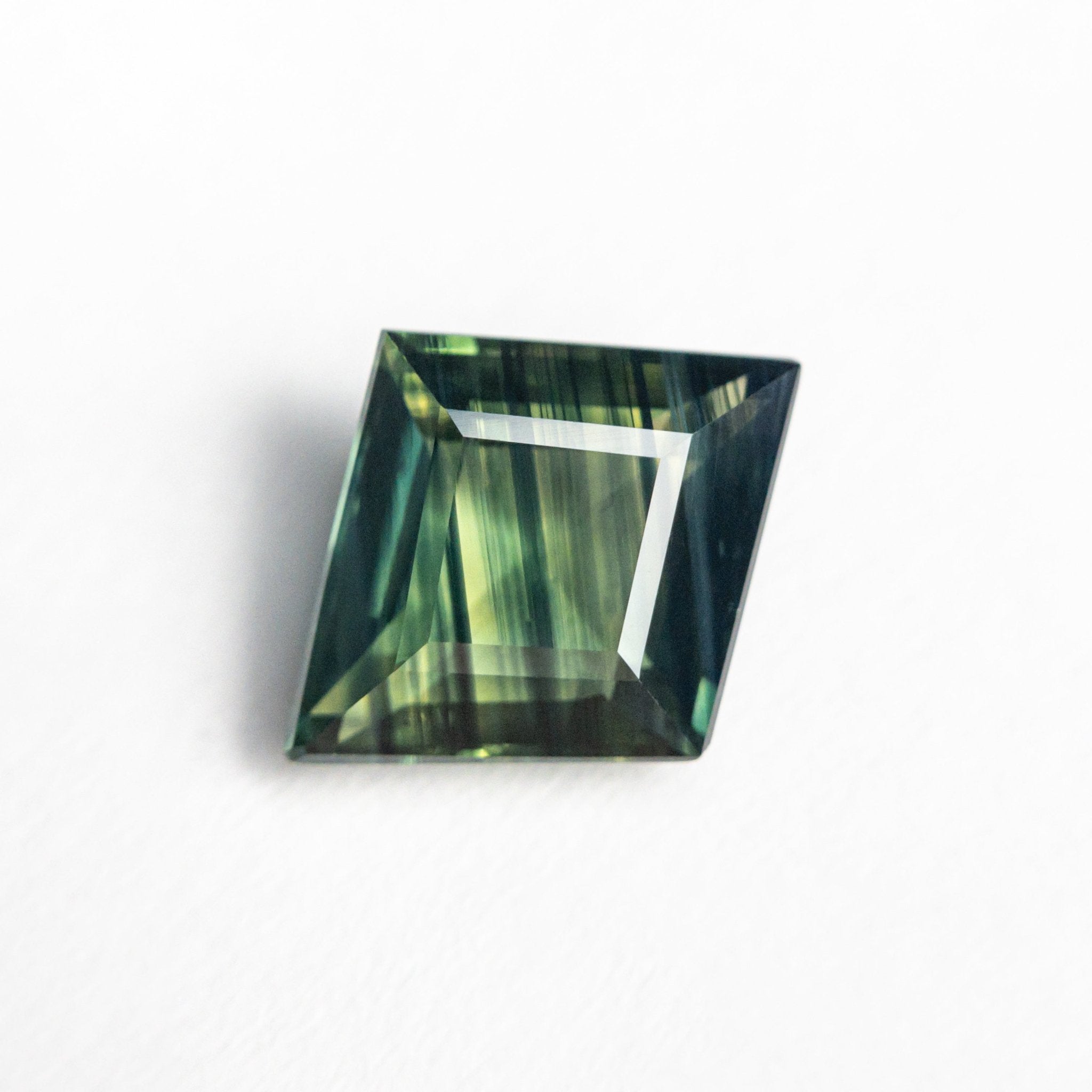 1.74ct 10.01x8.19x3.59mm Lozenge Step Cut Sapphire 23804-02 - MTD