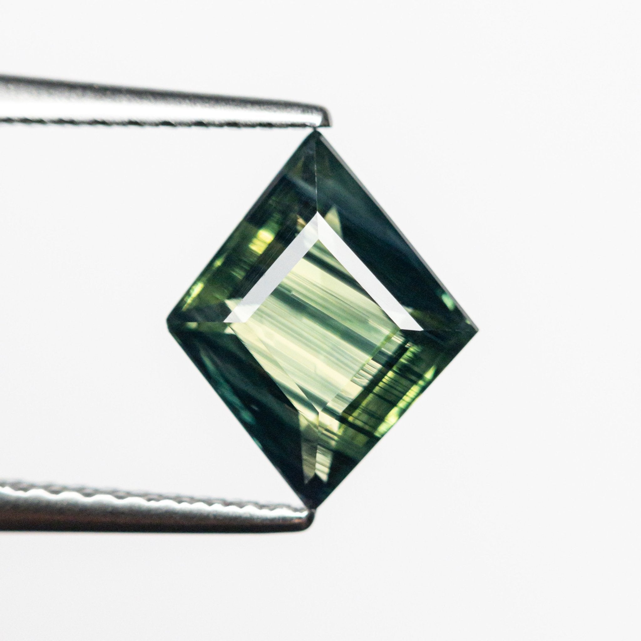 1.74ct 10.01x8.19x3.59mm Lozenge Step Cut Sapphire 23804-02 - MTD