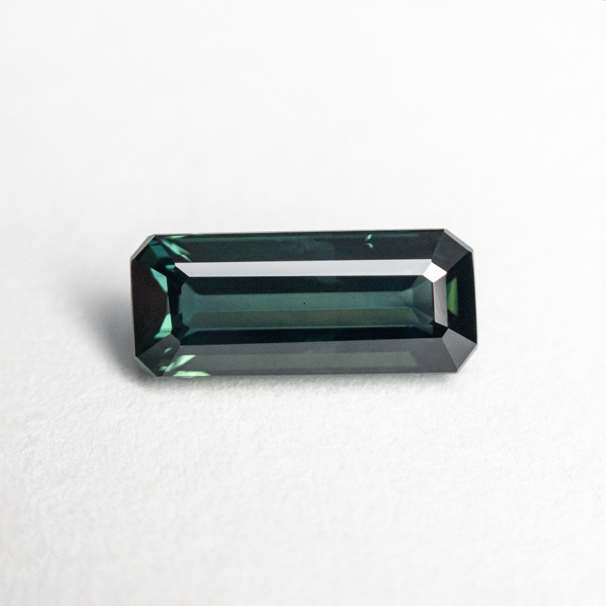 1.58ct 9.43x3.98x3.38mm Cut Corner Rectangle Step Cut Sapphire 23816 - 01 - MTD