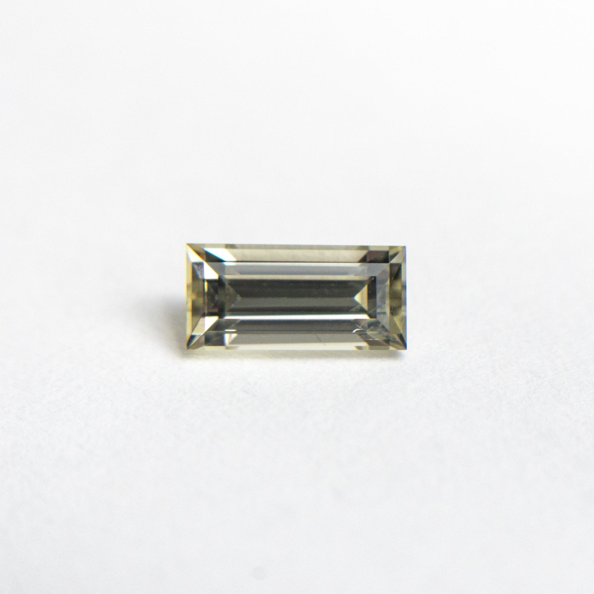 0.75ct 6.71x3.28x2.97mm Baguette Step Cut Sapphire 24172-01 - MTD