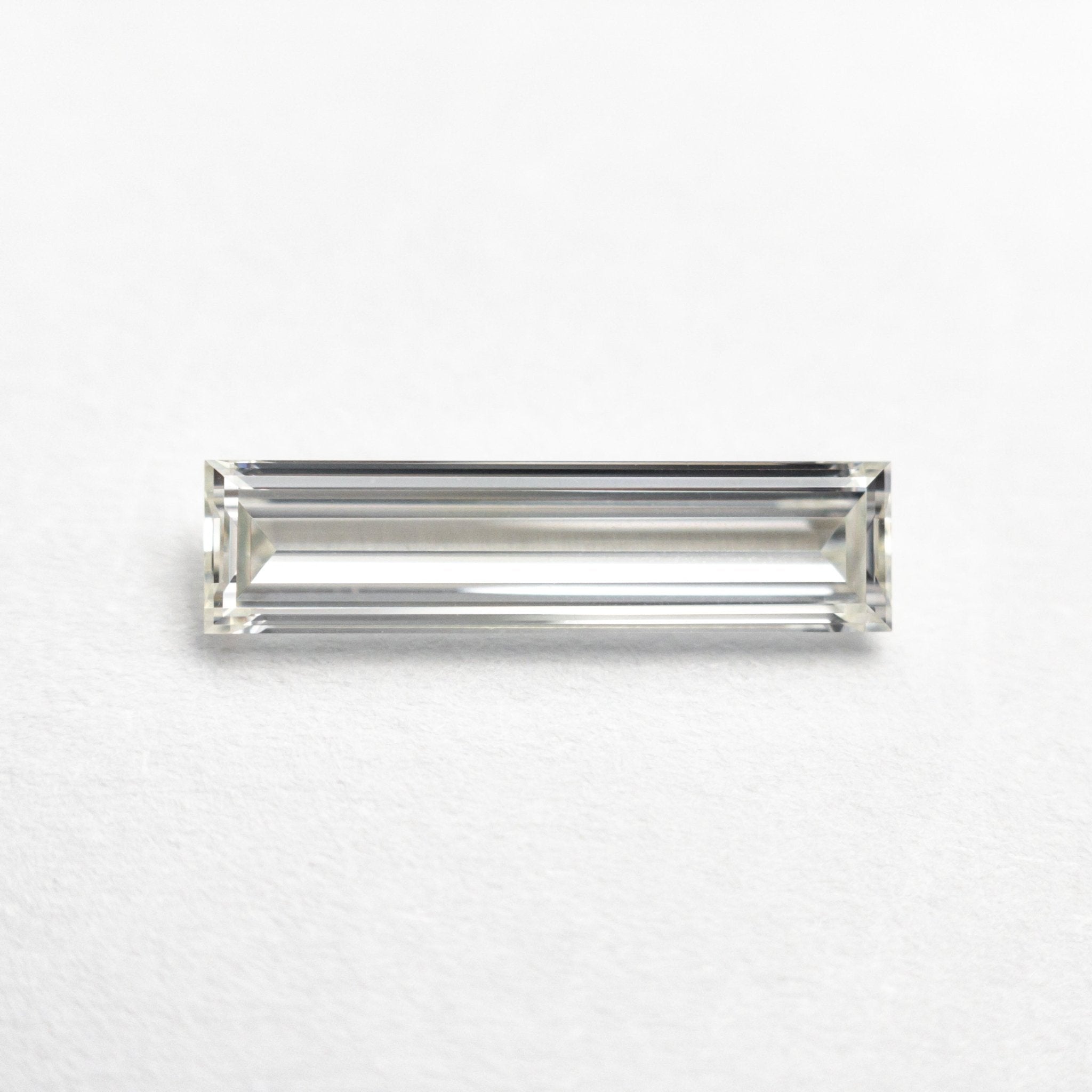 0.70ct 11.58x2.89x1.80mm GIA Internally Flawless H Baguette Step Cut 24300-01 - MTD