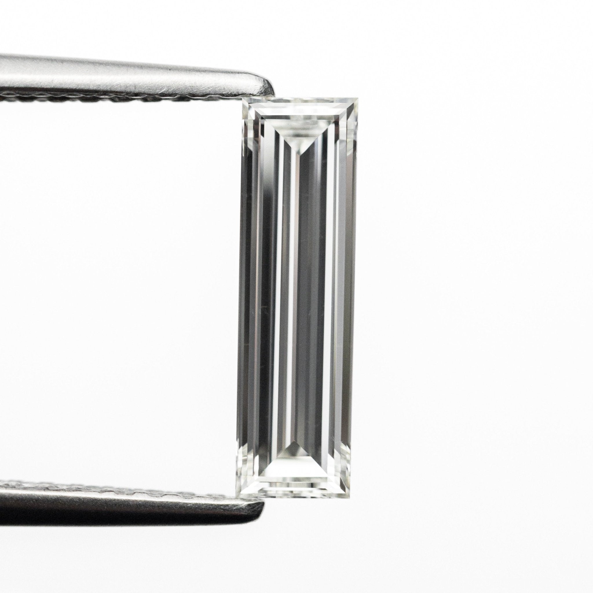 0.78ct 11.17x3.24x2.06mm GIA VS2 H Baguette Step Cut 24303 - 01 - MTD