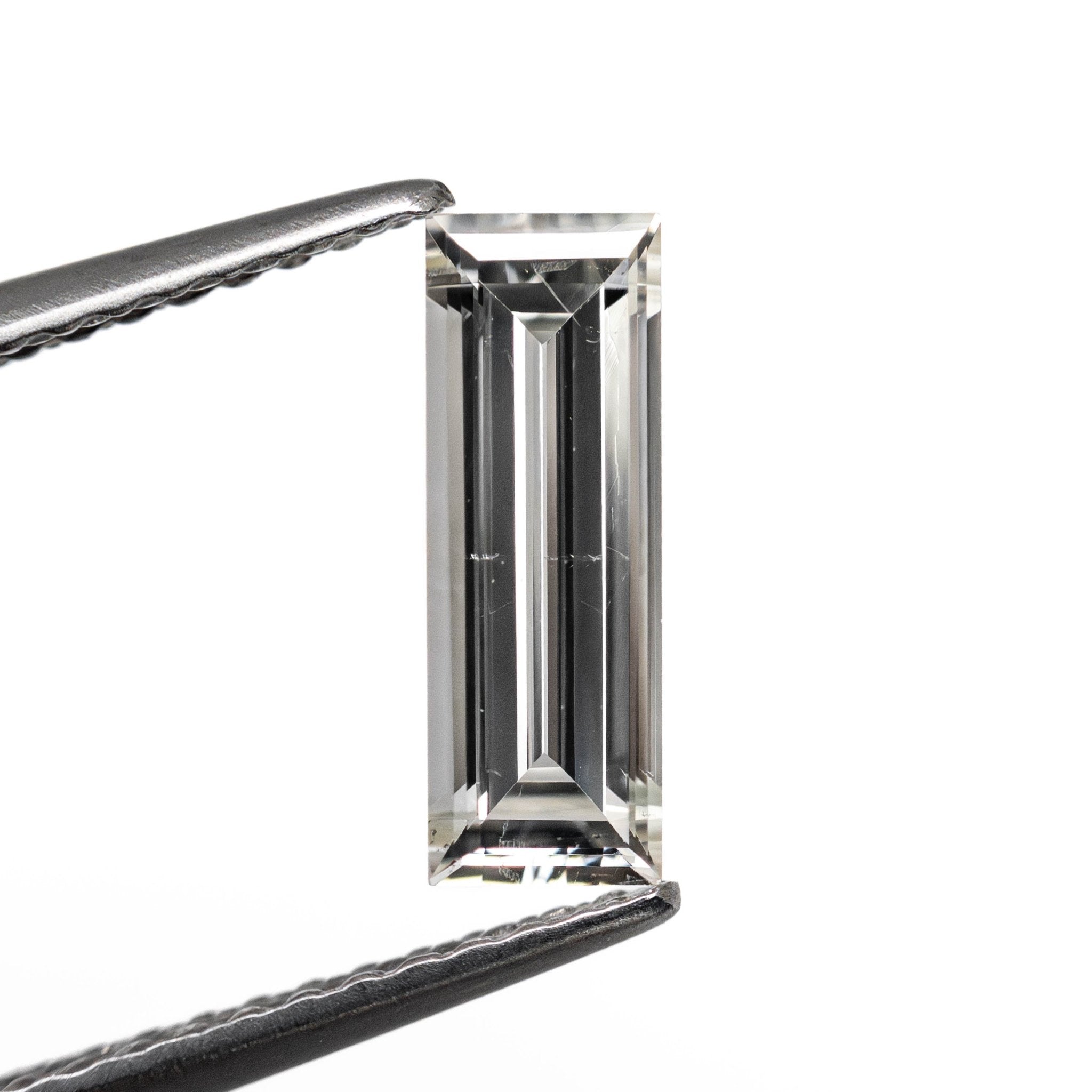 0.77ct 10.02x3.50x2.24mm SI1 J Baguette Step Cut 24699 - 01 - MTD
