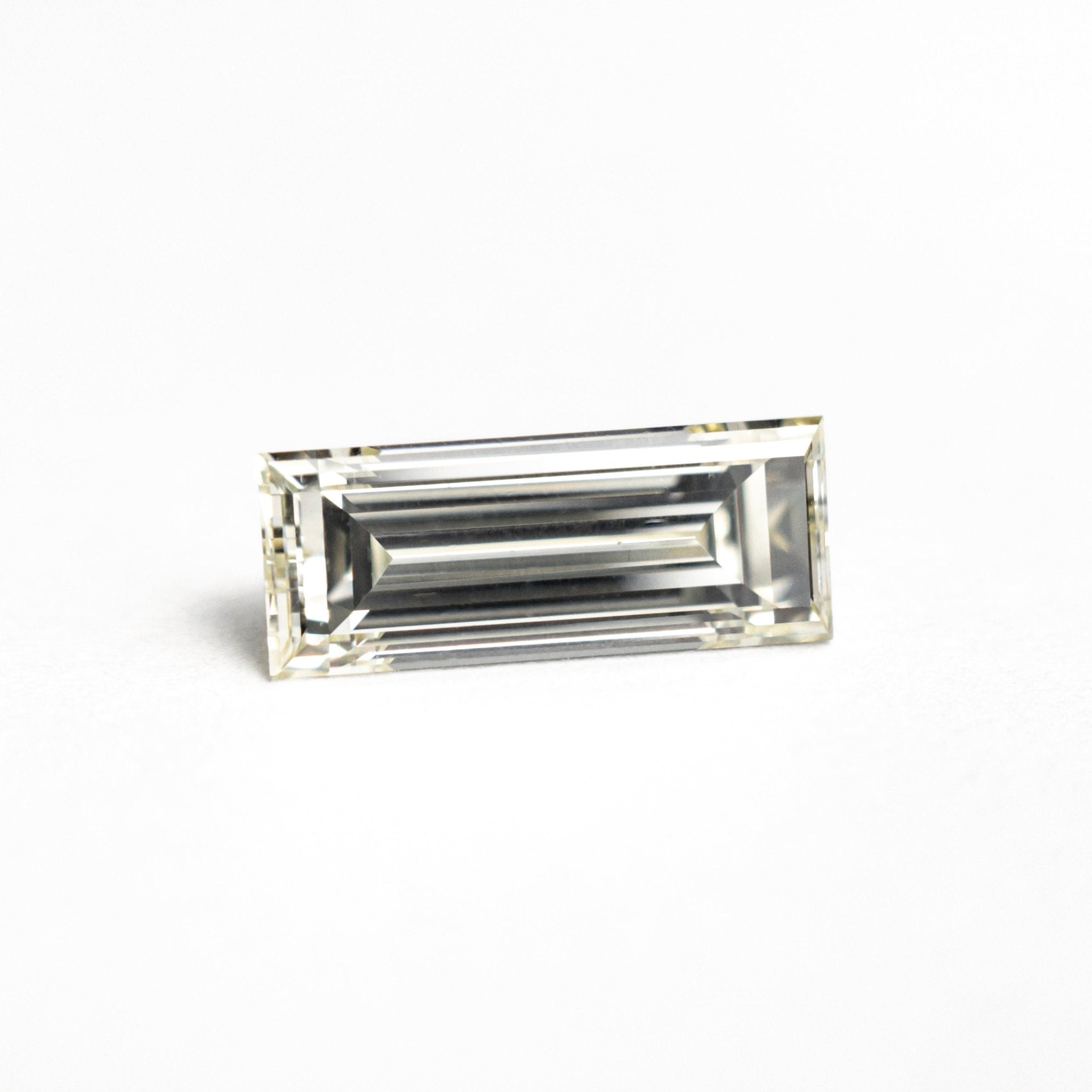 1.11ct 9.55x3.80x2.97mm VS2 O - P Baguette Step Cut 26124 - 02 - MTD