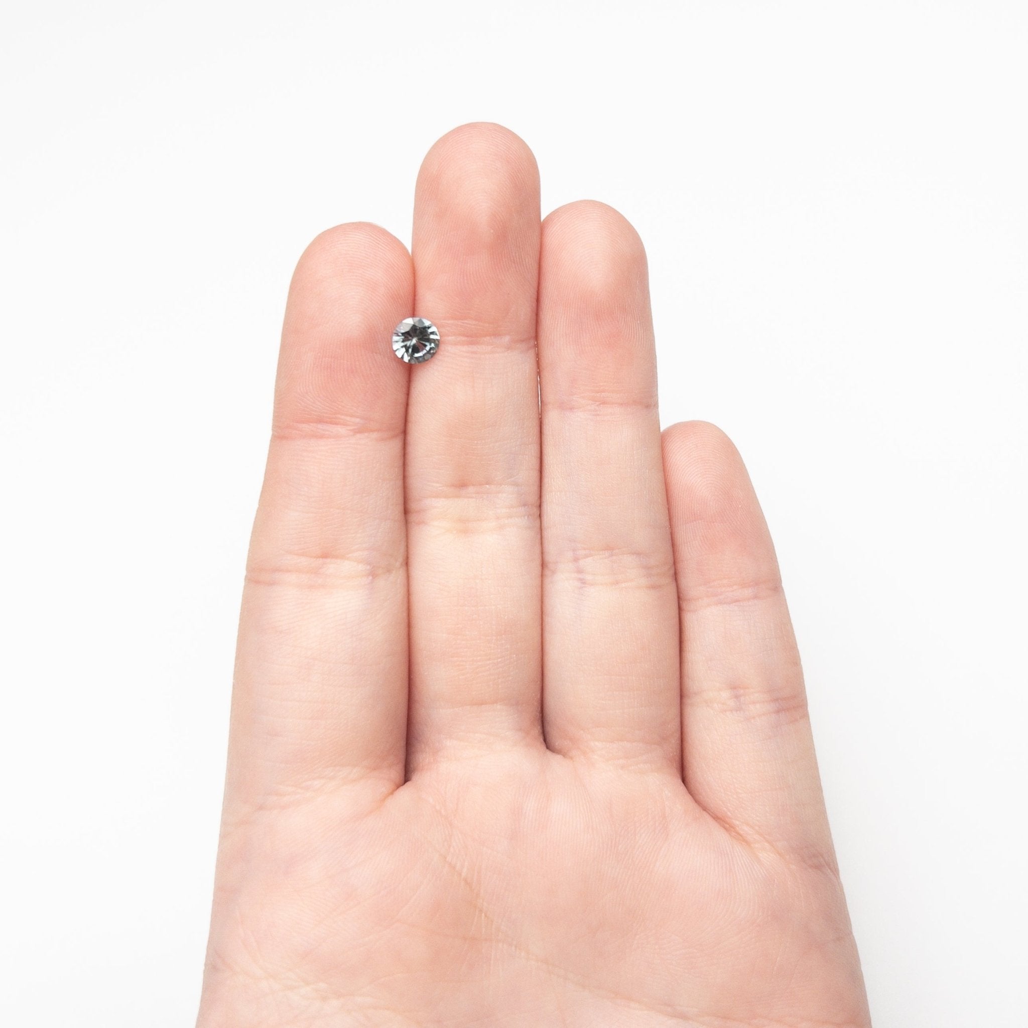0.77ct 5.54x5.52x3.42mm Round Brilliant Sapphire 26134-07 - MTD