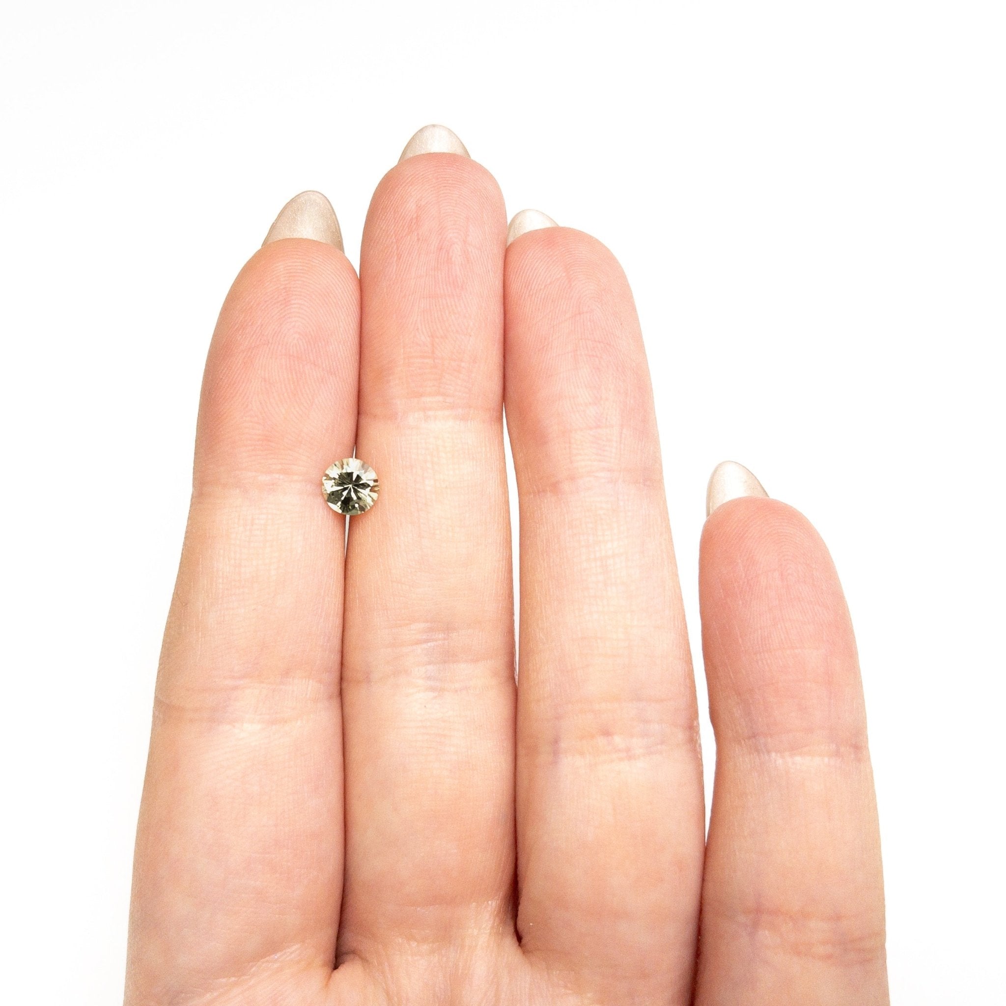 0.76ct 5.56x5.52x3.52mm Round Brilliant Sapphire 26134-16 - MTD