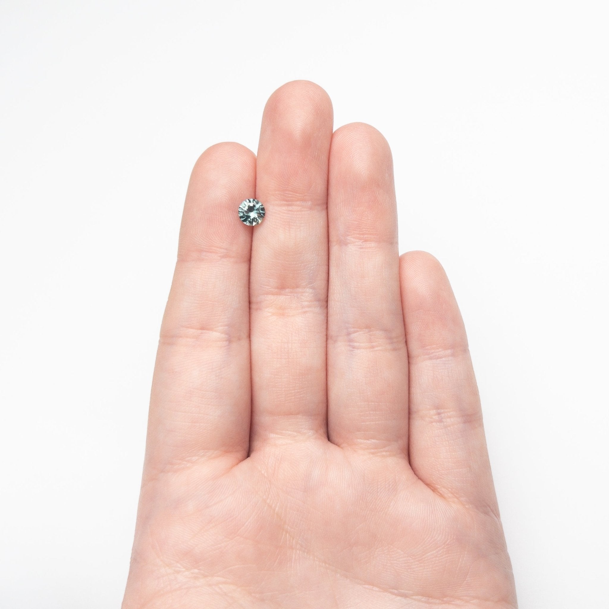 0.81ct 5.54x5.51x3.56mm Round Brilliant Sapphire 26134-24 - MTD