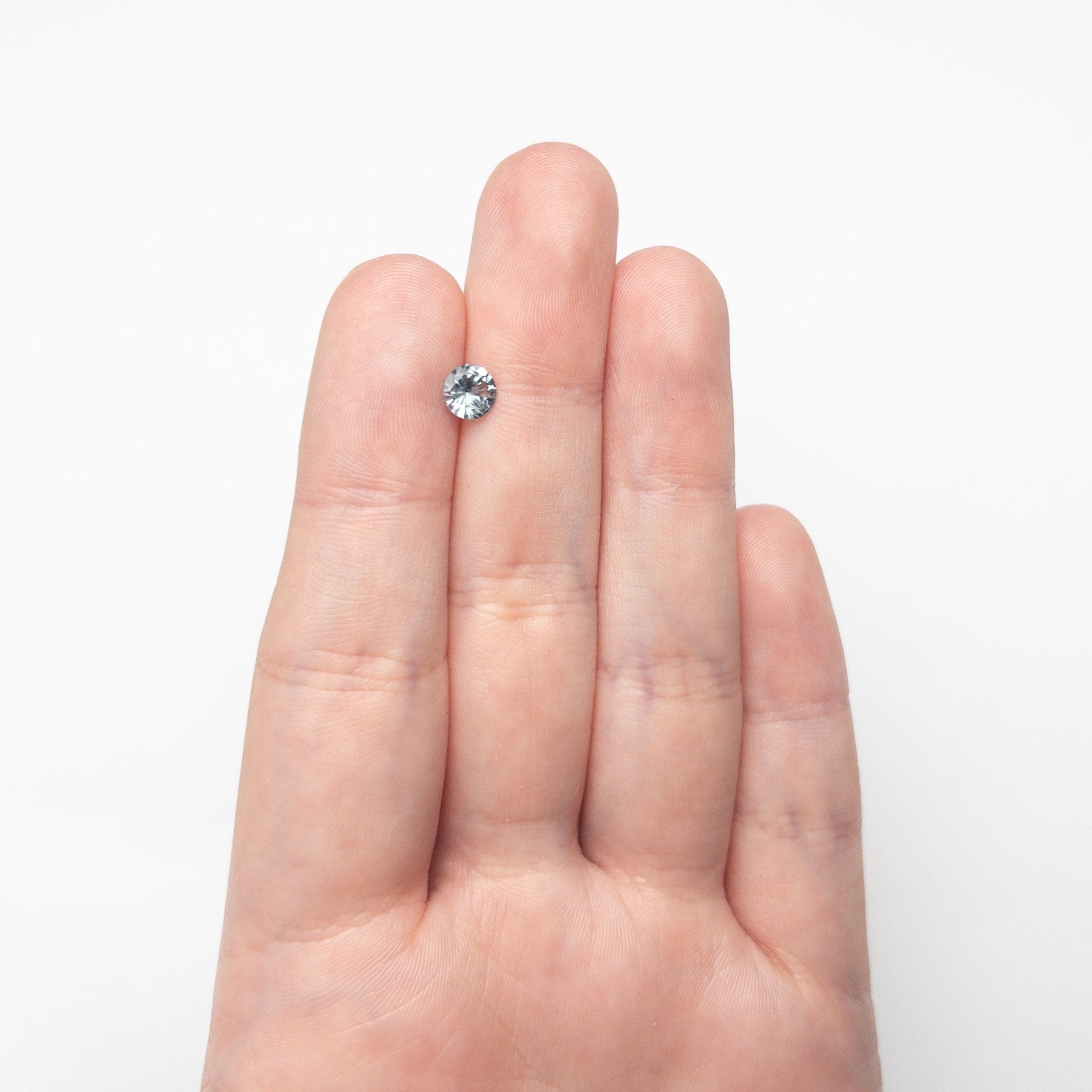 0.73ct 5.57x5.53x3.29mm Round Brilliant Sapphire 26134-27 - MTD