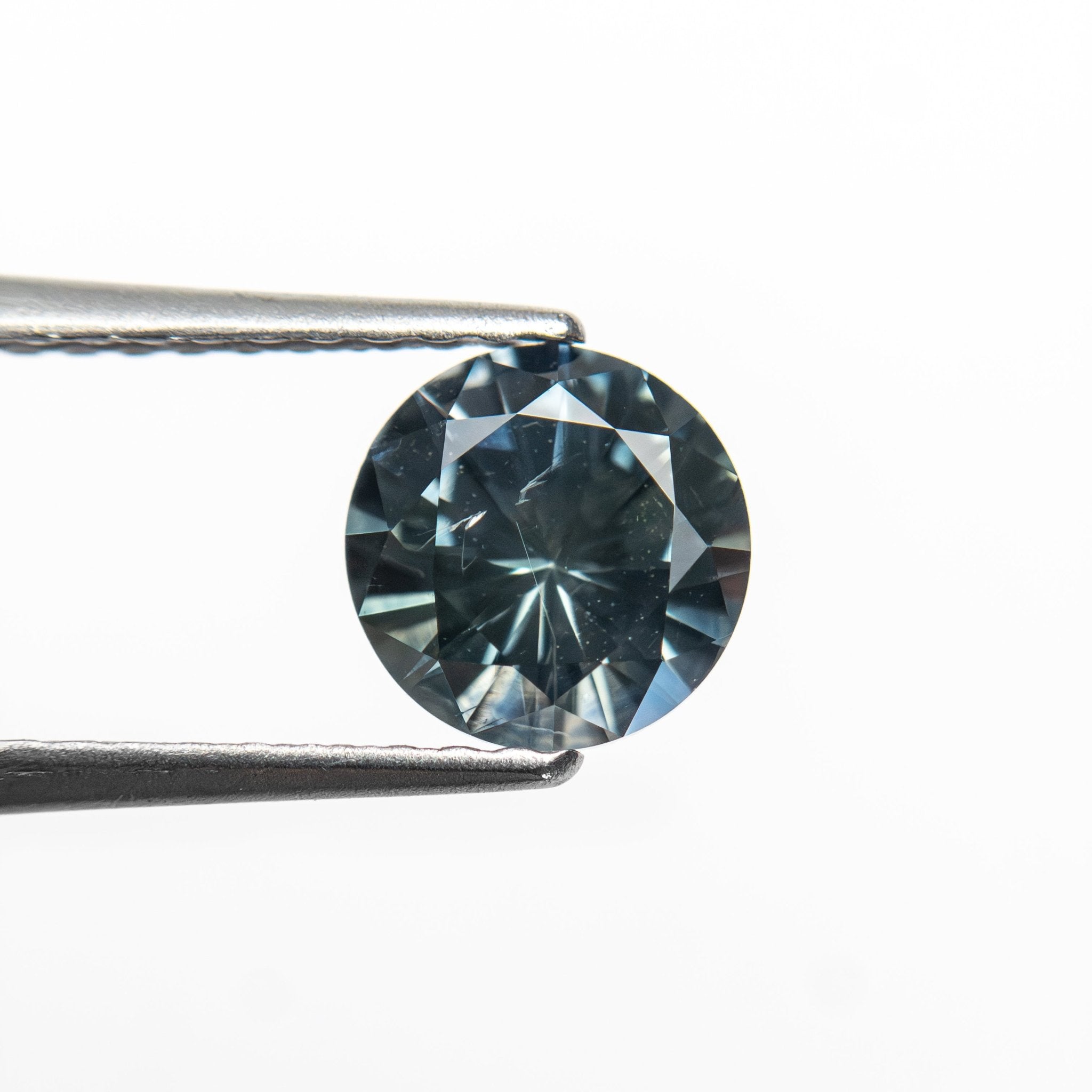1.04ct 6.10x6.07x3.89mm Round Brilliant Sapphire 26141-25 - MTD