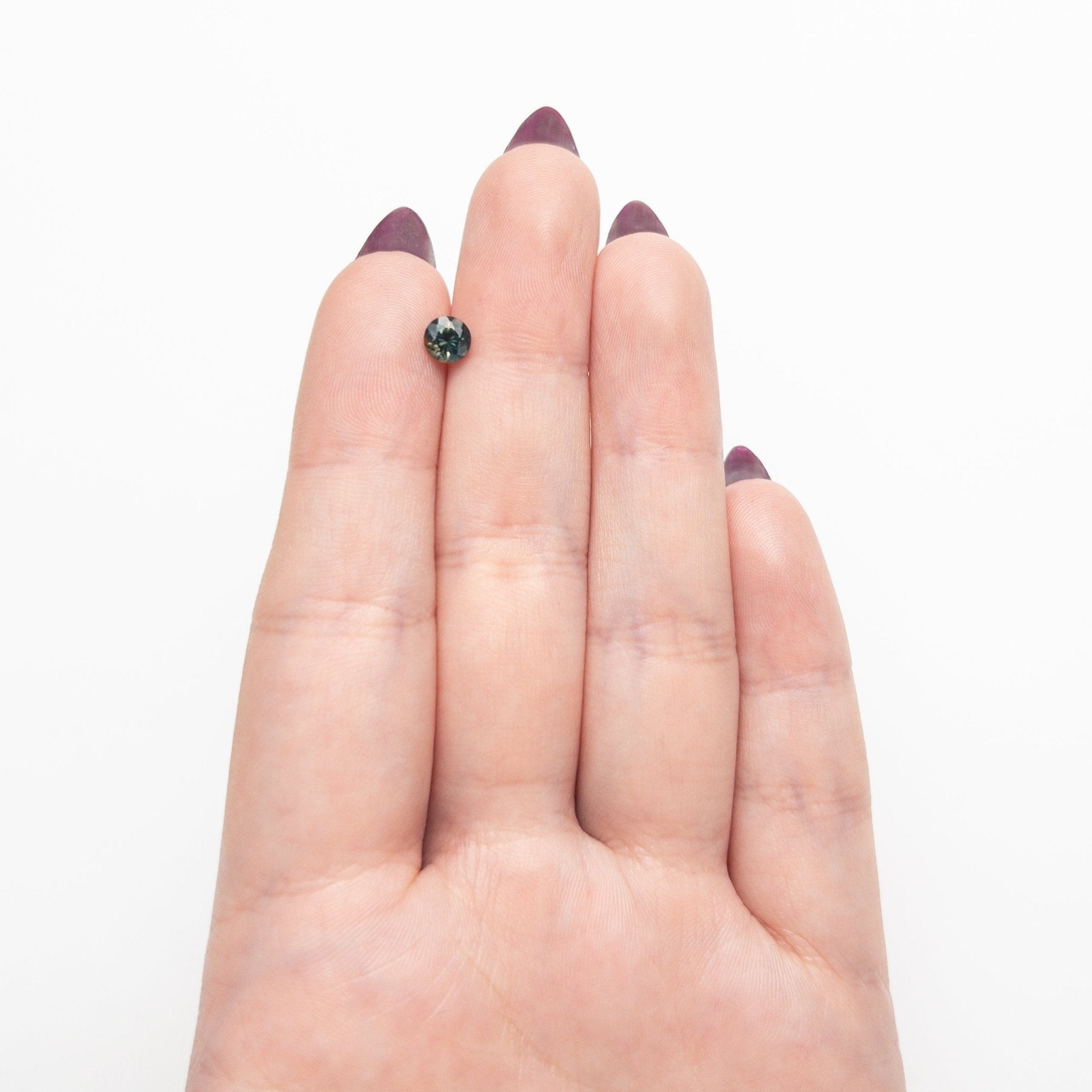 0.70ct 5.16x5.10x3.61mm Round Brilliant Sapphire 26526-08 - MTD