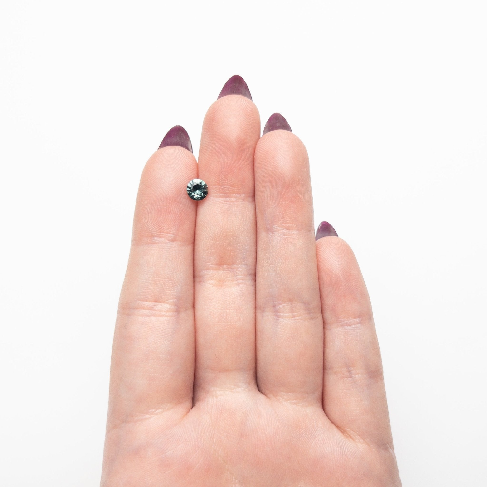 0.70ct 5.40x5.37x3.29mm Round Brilliant Sapphire 26526-09 - MTD
