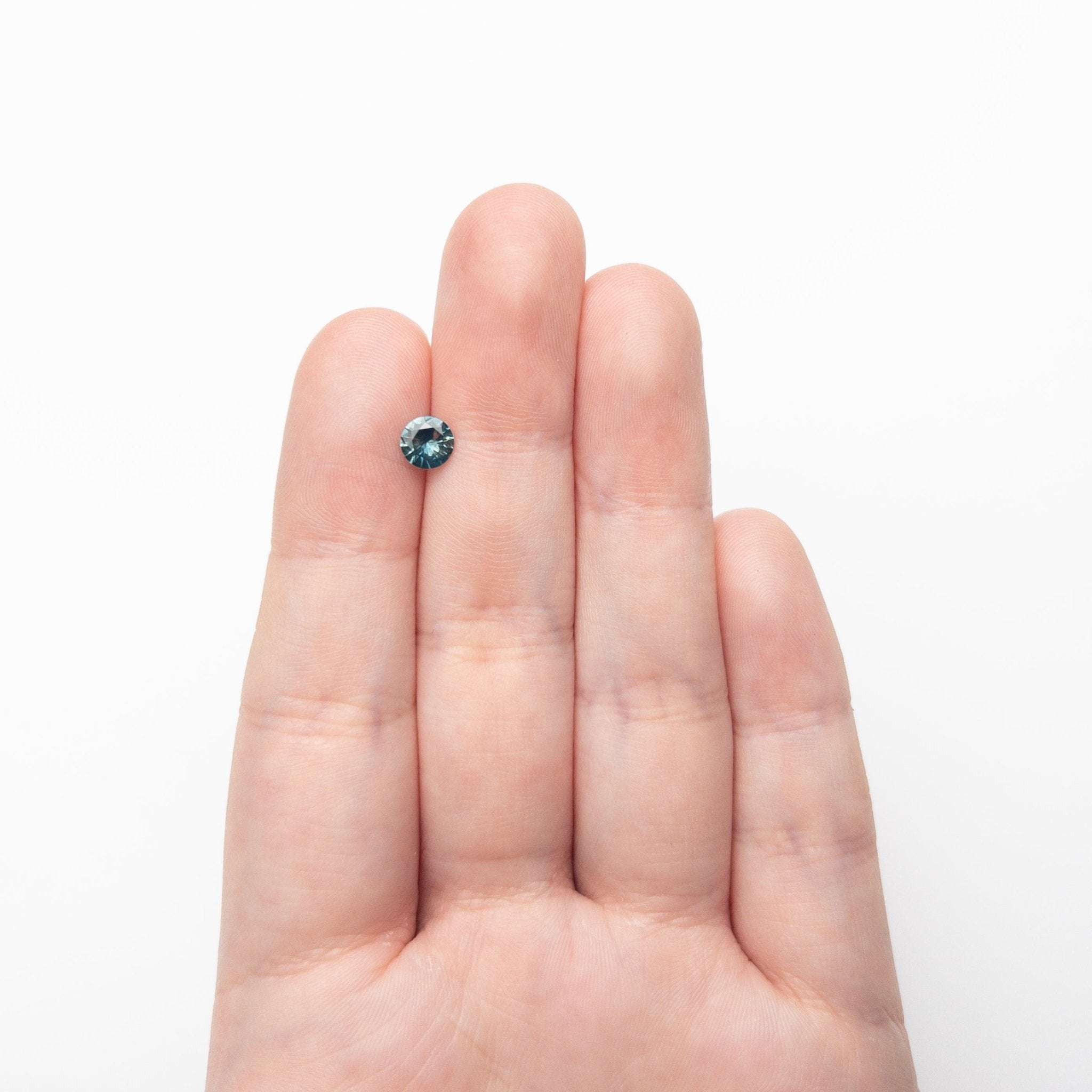 0.69ct 5.50x5.53x3.12mm Round Brilliant Sapphire 26580-01 - MTD