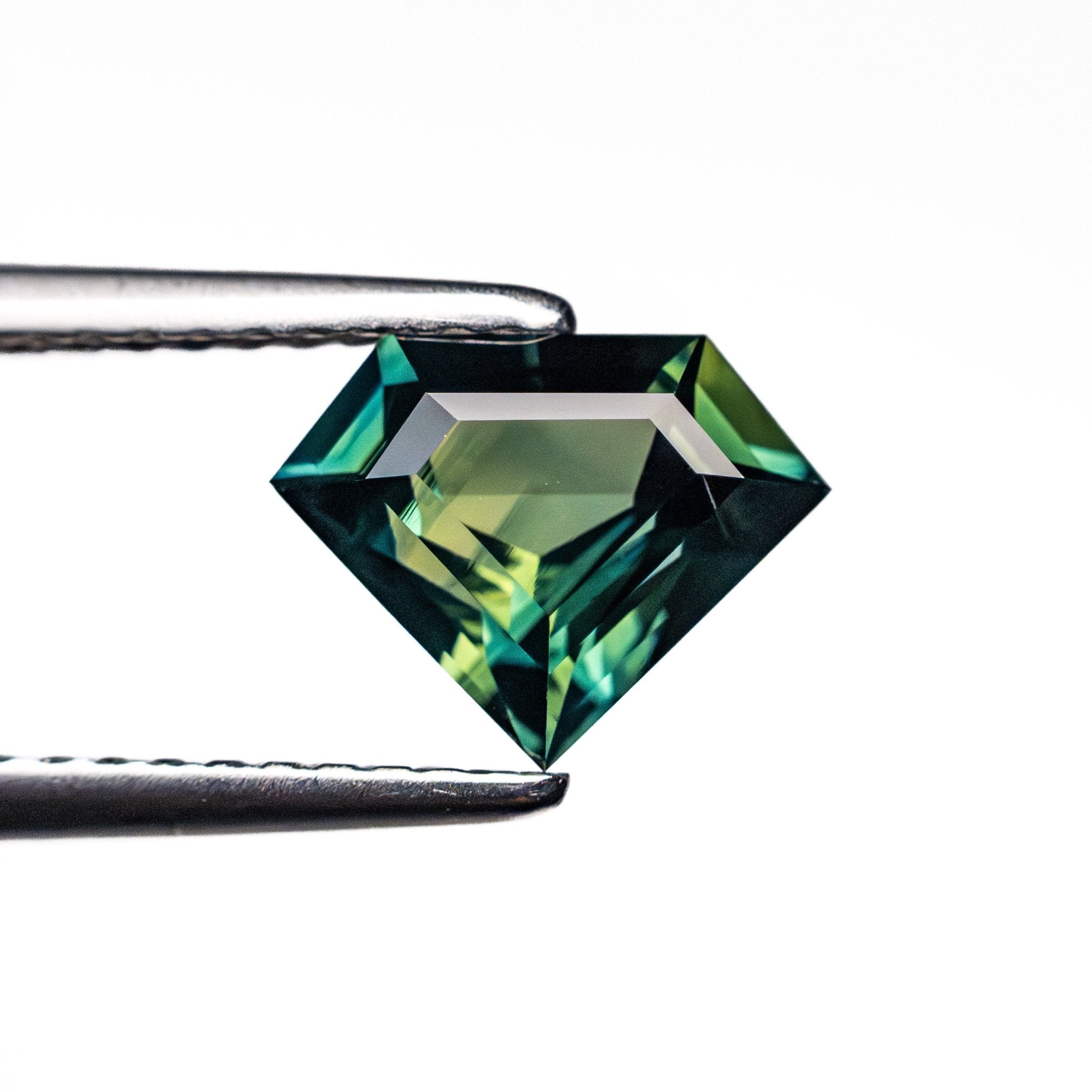 1.30ct 6.72x8.55x3.80mm Shield Step Cut Sapphire 26724-01 - MTD