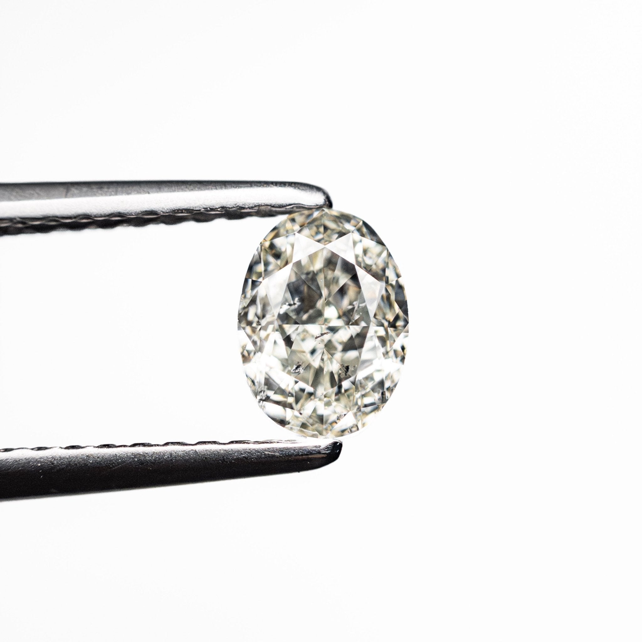 0.70ct 6.09x4.50x3.04mm SI2 K Oval Brilliant 27065-05 - MTD