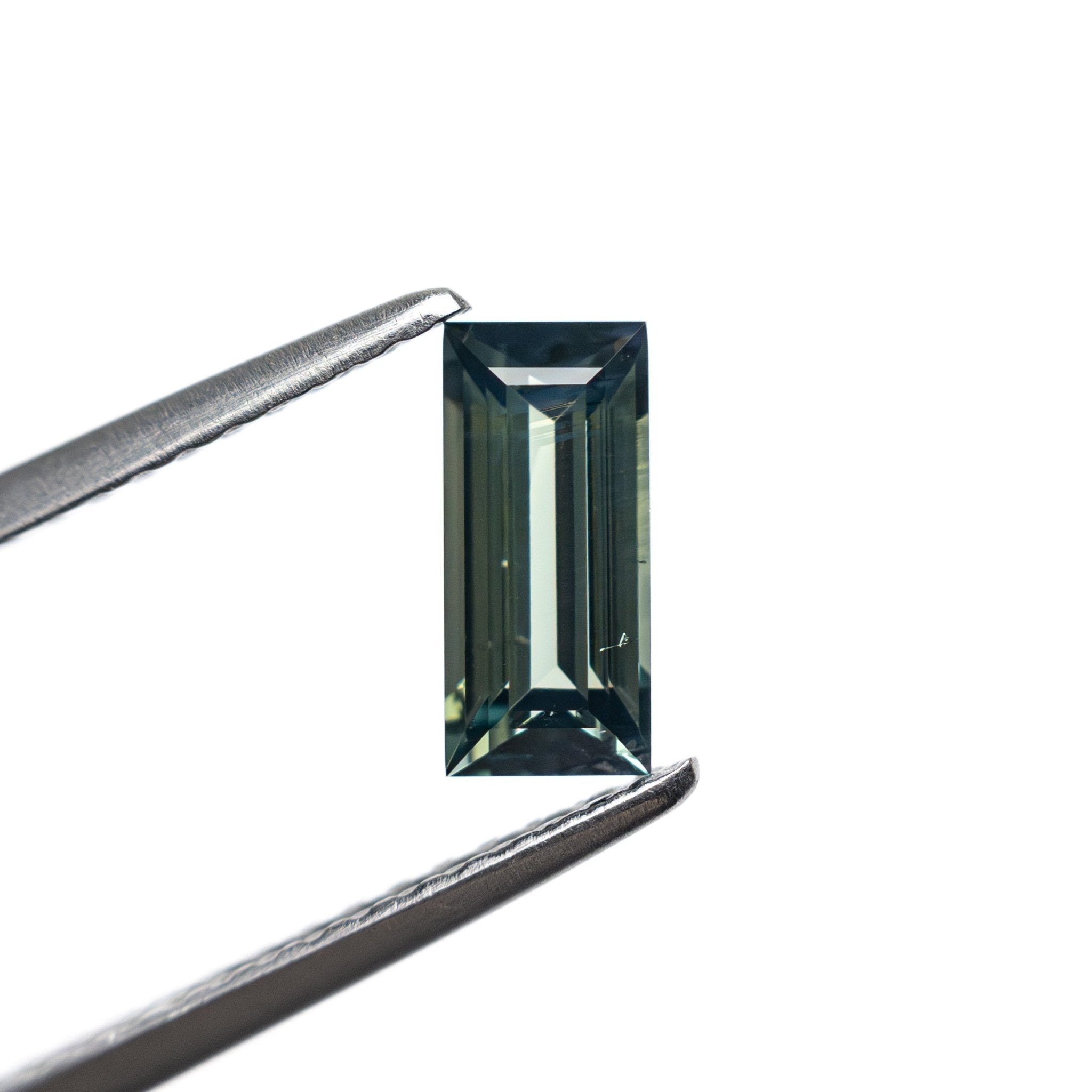 0.74ct 7.27x3.44x2.54mm Rectangle Step Cut Sapphire 27336 - 44 - MTD