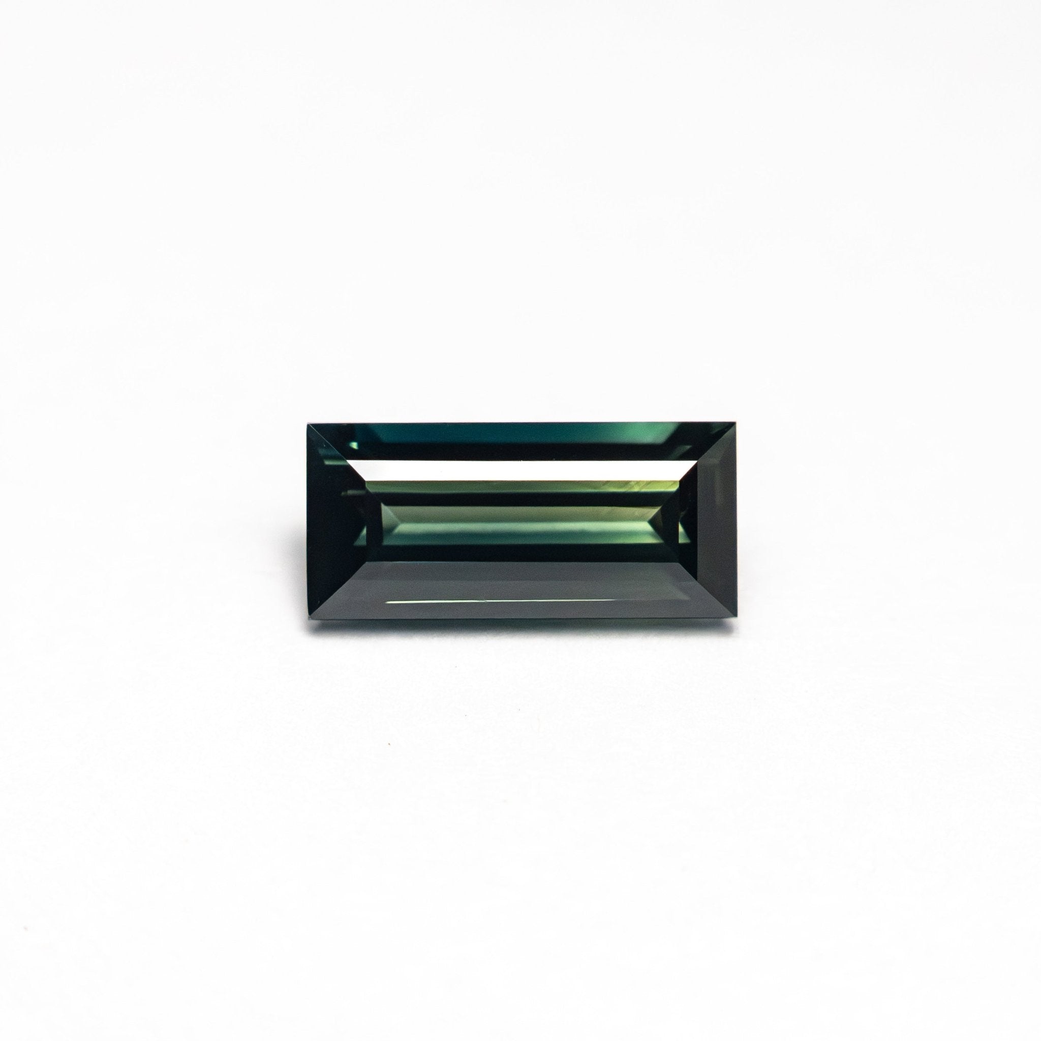 0.71ct 7.14x3.43x2.45mm Rectangle Step Cut Sapphire 27336 - 46 - MTD