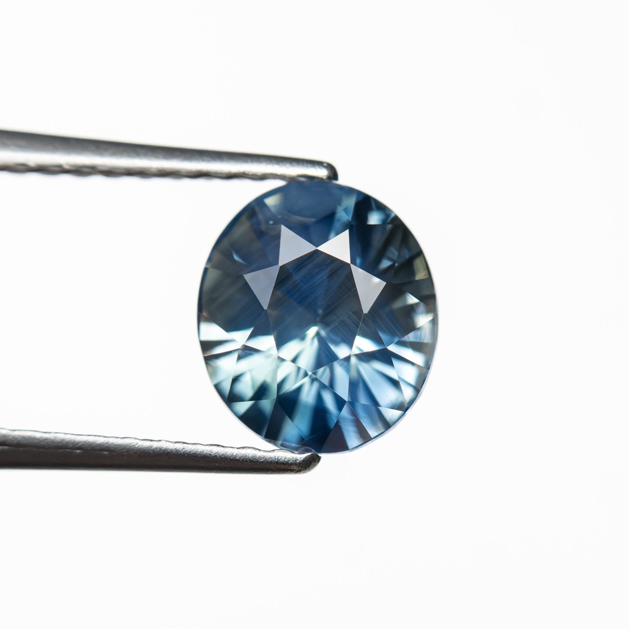 1.58ct 7.07x6.22x4.71mm Oval Brilliant Sapphire 27482 - 01 - MTD