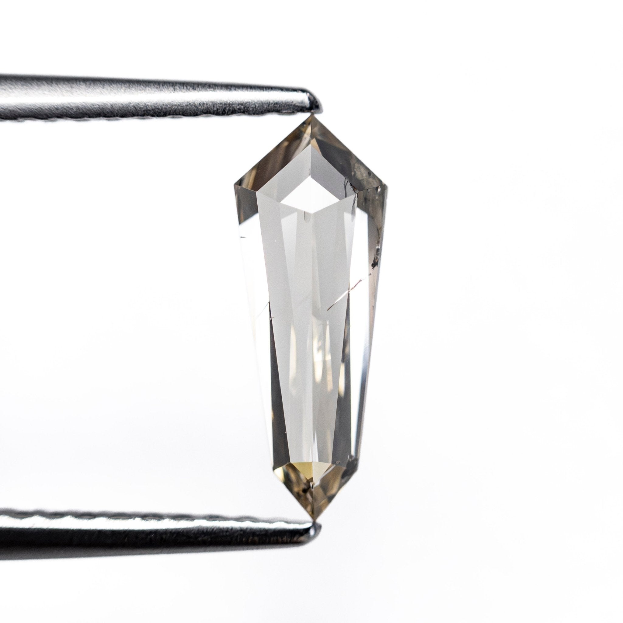 0.83ct 10.96x4.15x2.50mm Shield Step Cut 27537-35 - MTD