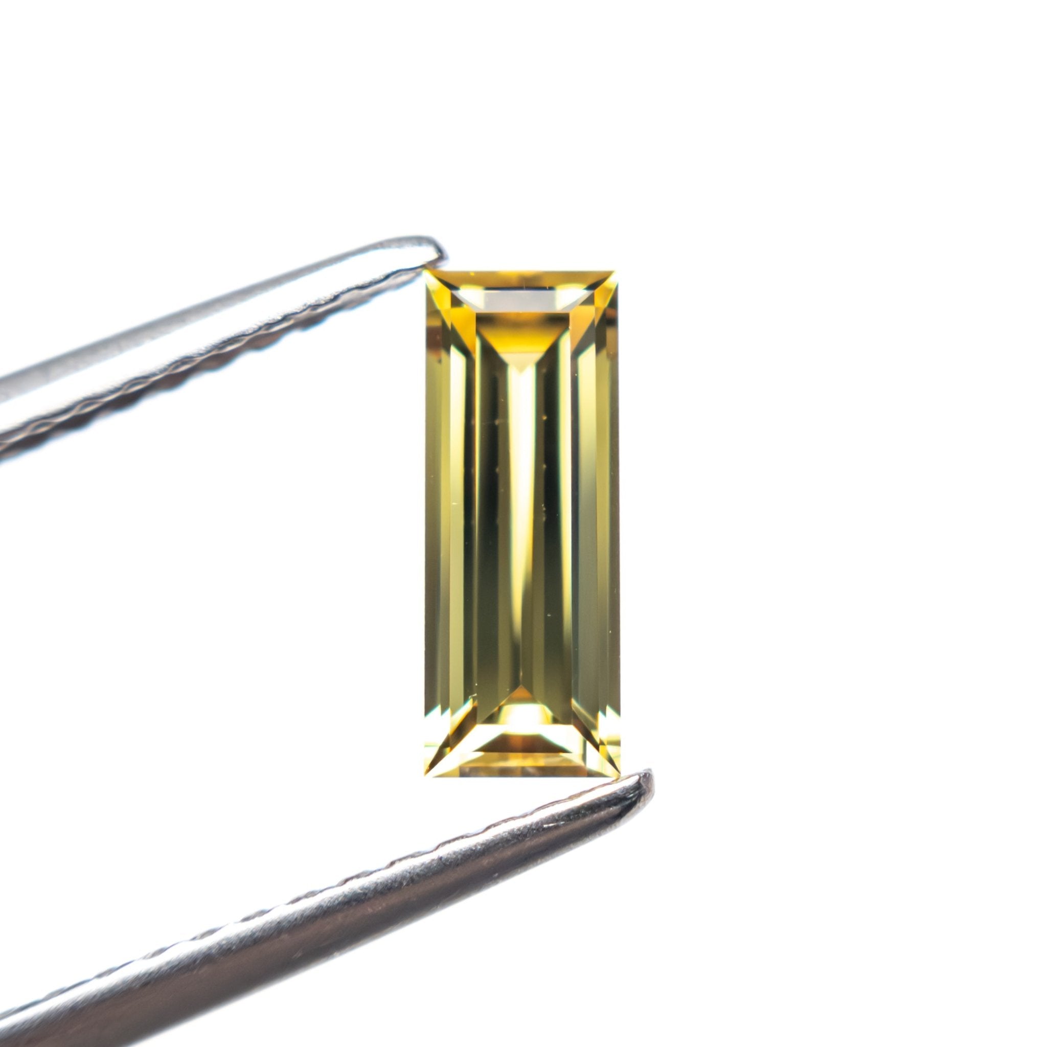 0.75ct 8.56x3.27x2.36mm Baguette Step Cut Sapphire 27719-03 - MTD