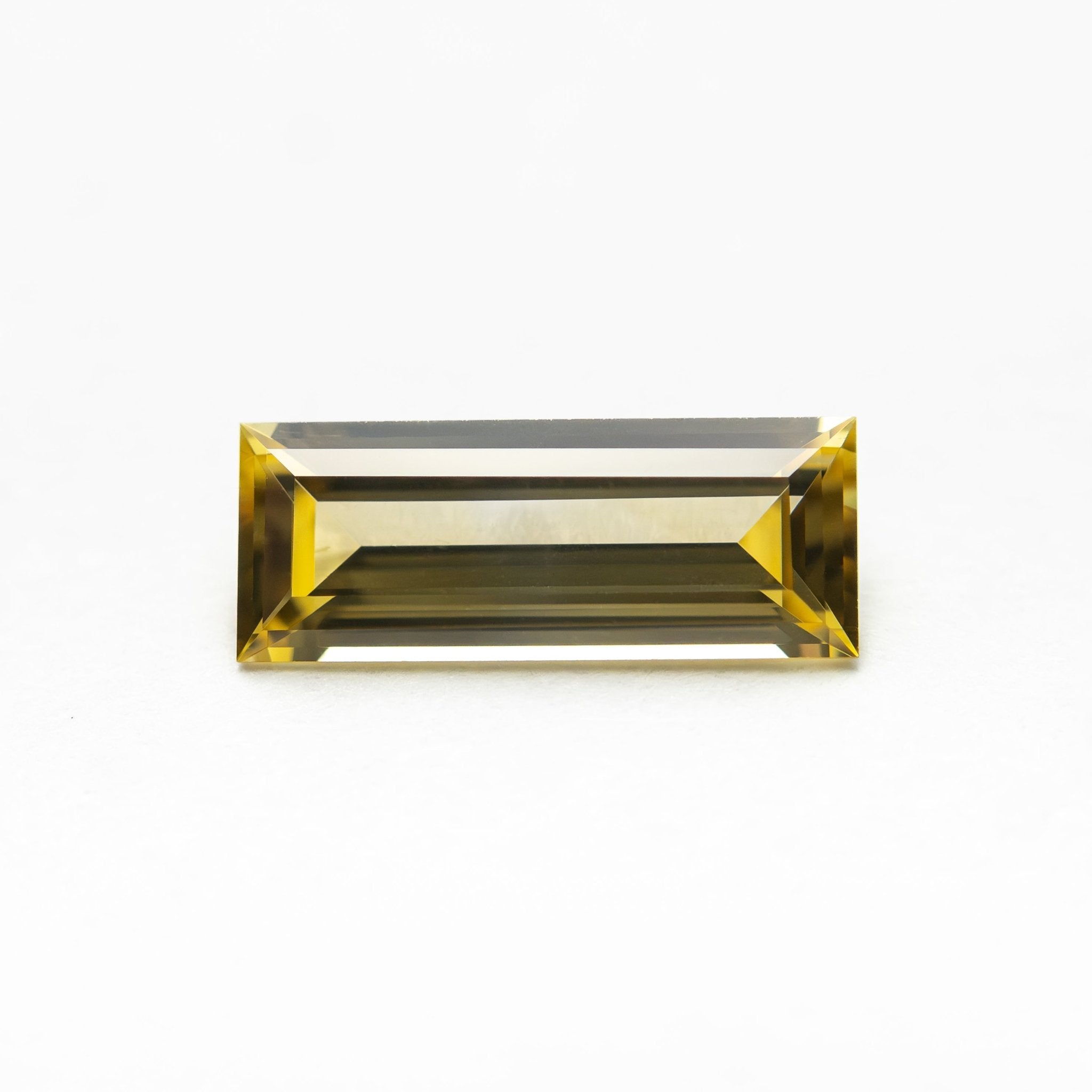 0.79ct 9.06x3.55x2.21mm Baguette Step Cut Sapphire 27719-05 - MTD