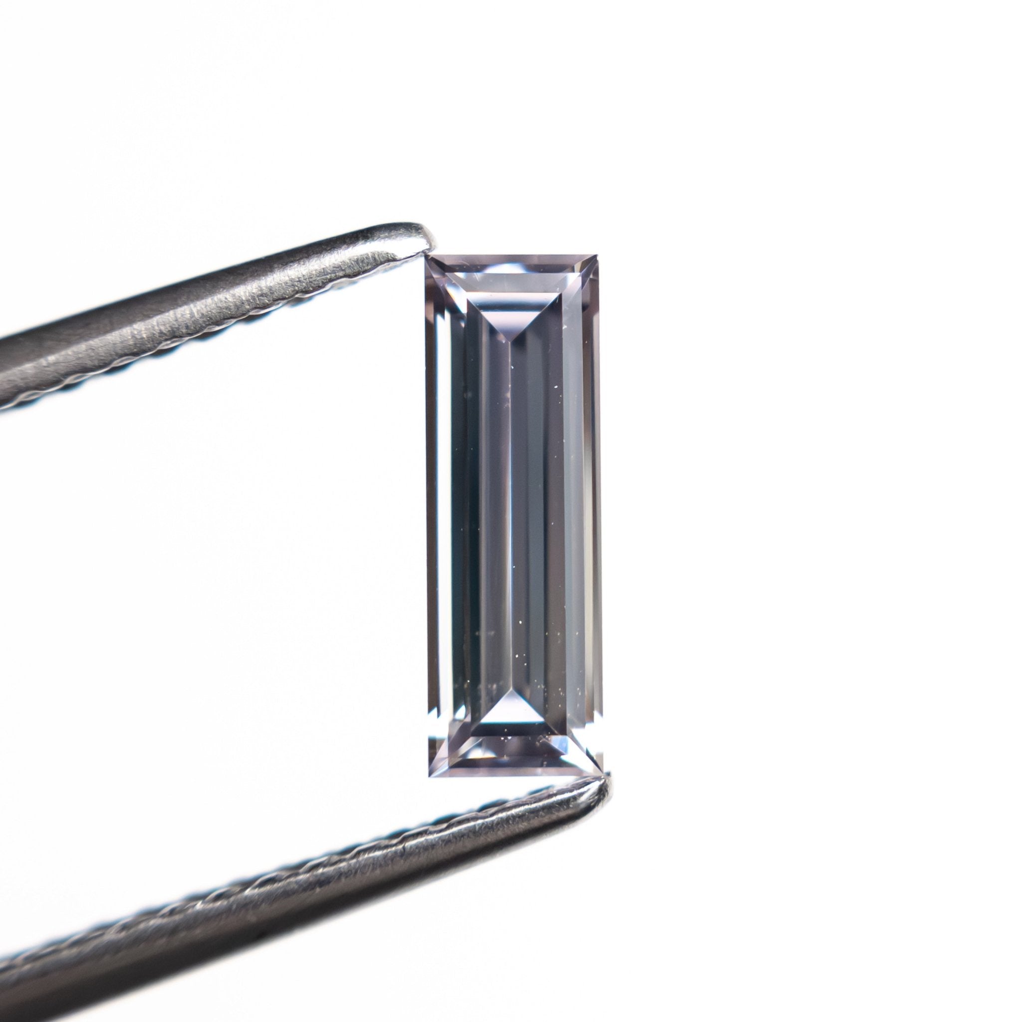 0.63ct 8.99x3.02x2.04mm Baguette Step Cut Sapphire 27720 - 02 - MTD