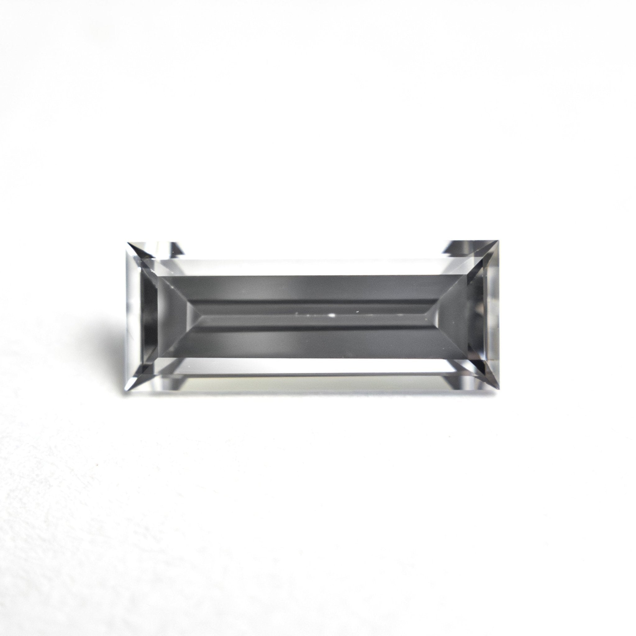 1.06ct 9.53x3.81x2.64mm Baguette Step Cut Sapphire 27720 - 07 - MTD