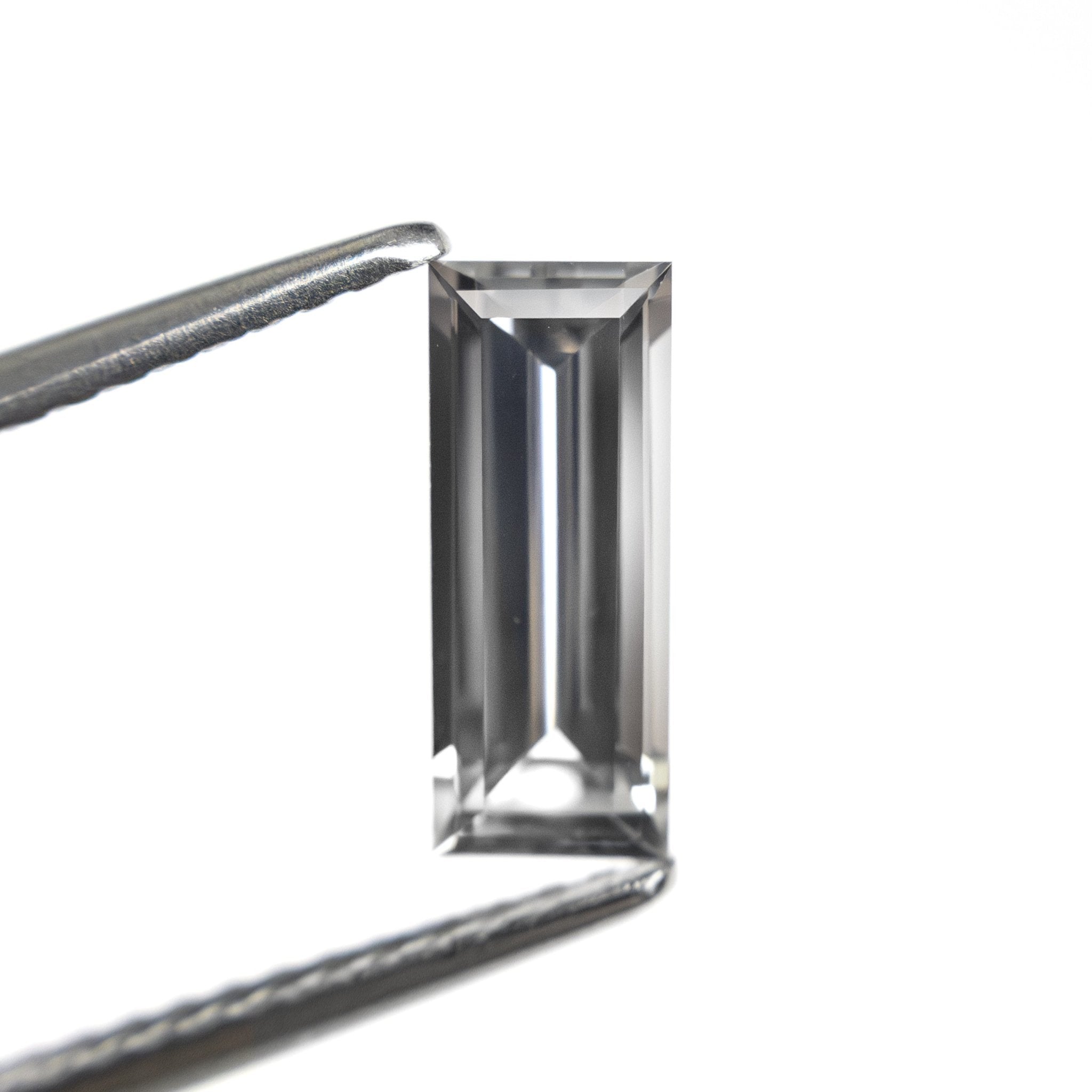 1.06ct 9.53x3.81x2.64mm Baguette Step Cut Sapphire 27720 - 07 - MTD