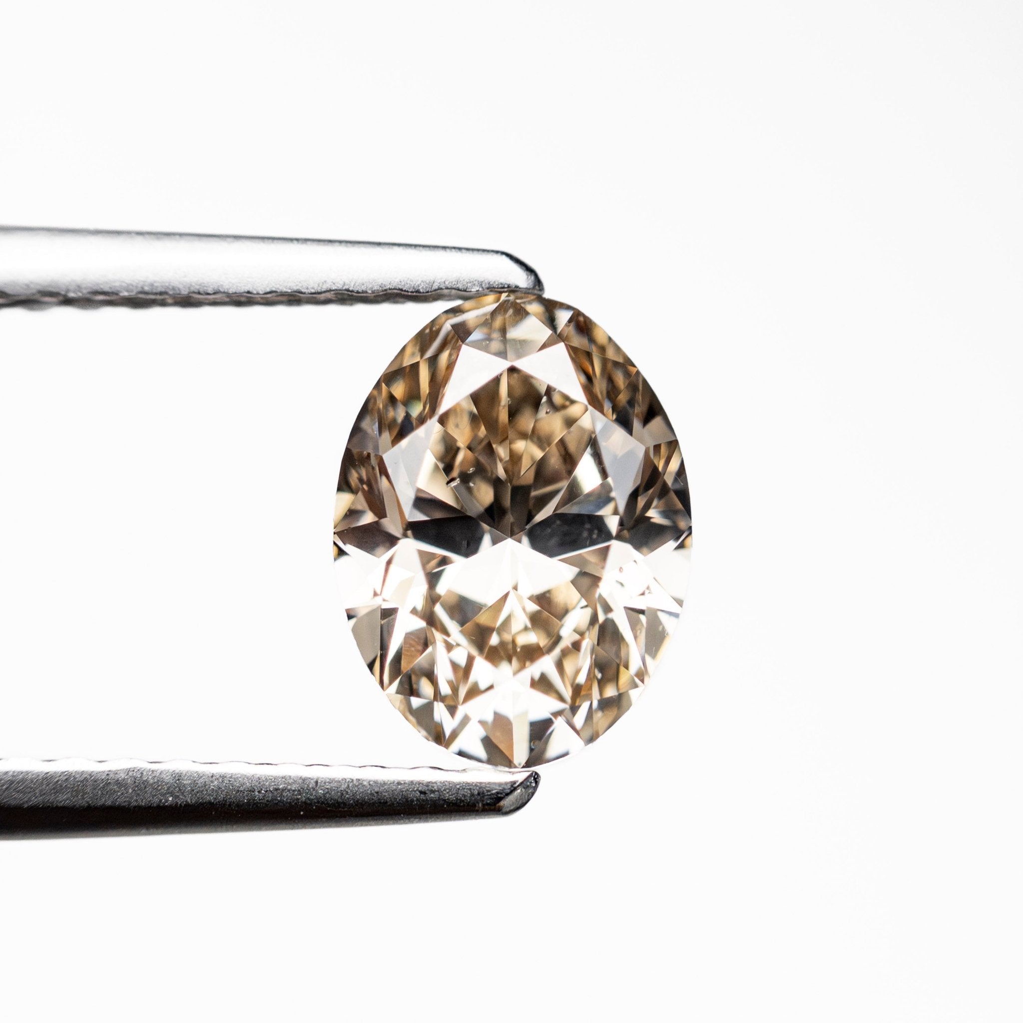 1.03ct 7.69x5.75x3.61mm SI2 C3 Oval Brilliant 🇨🇦 28004-01 - MTD