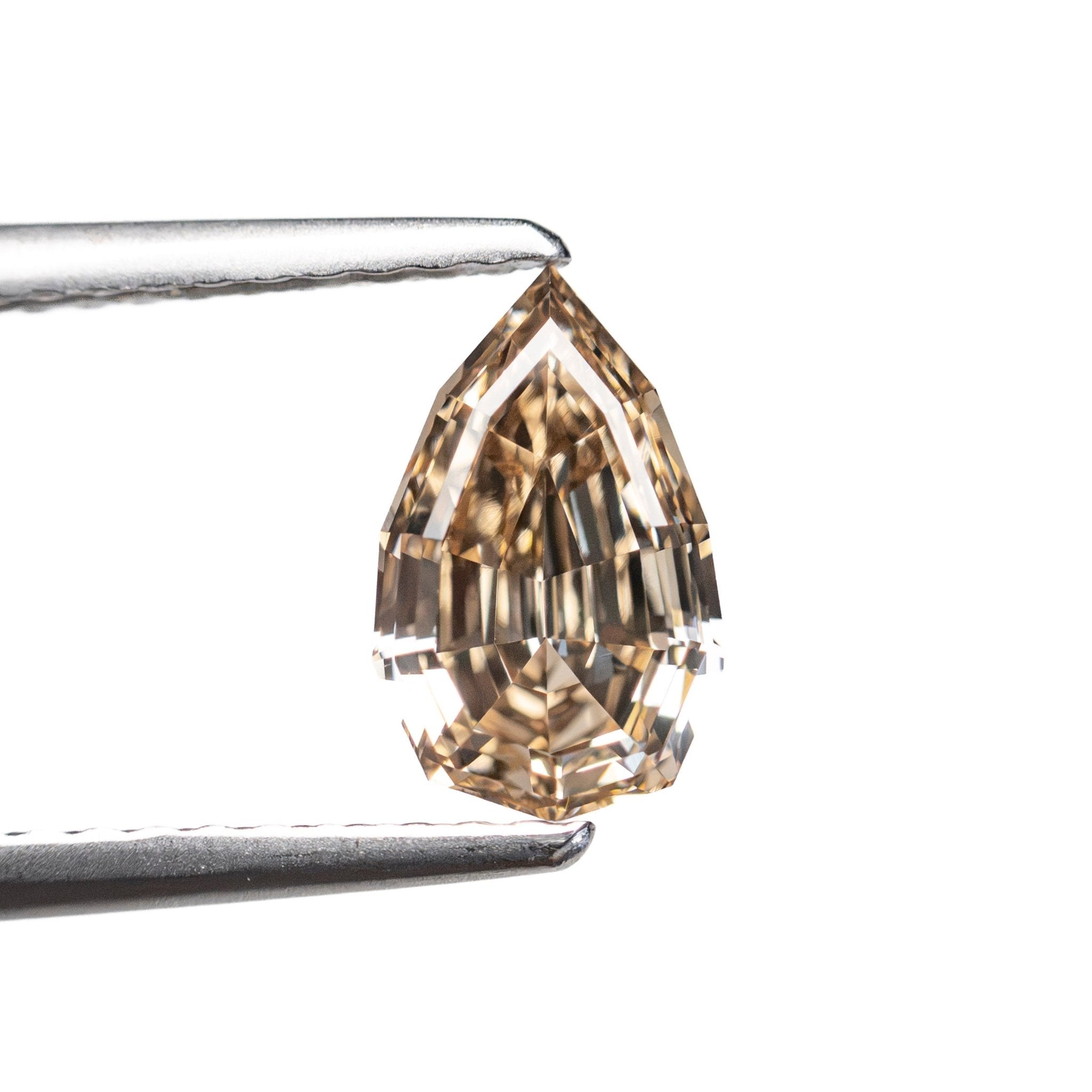 1.07ct 8.54x5.34x3.34 VS2 Fancy Orangey Brown Geo Pear Step Cut 28053-01 - MTD