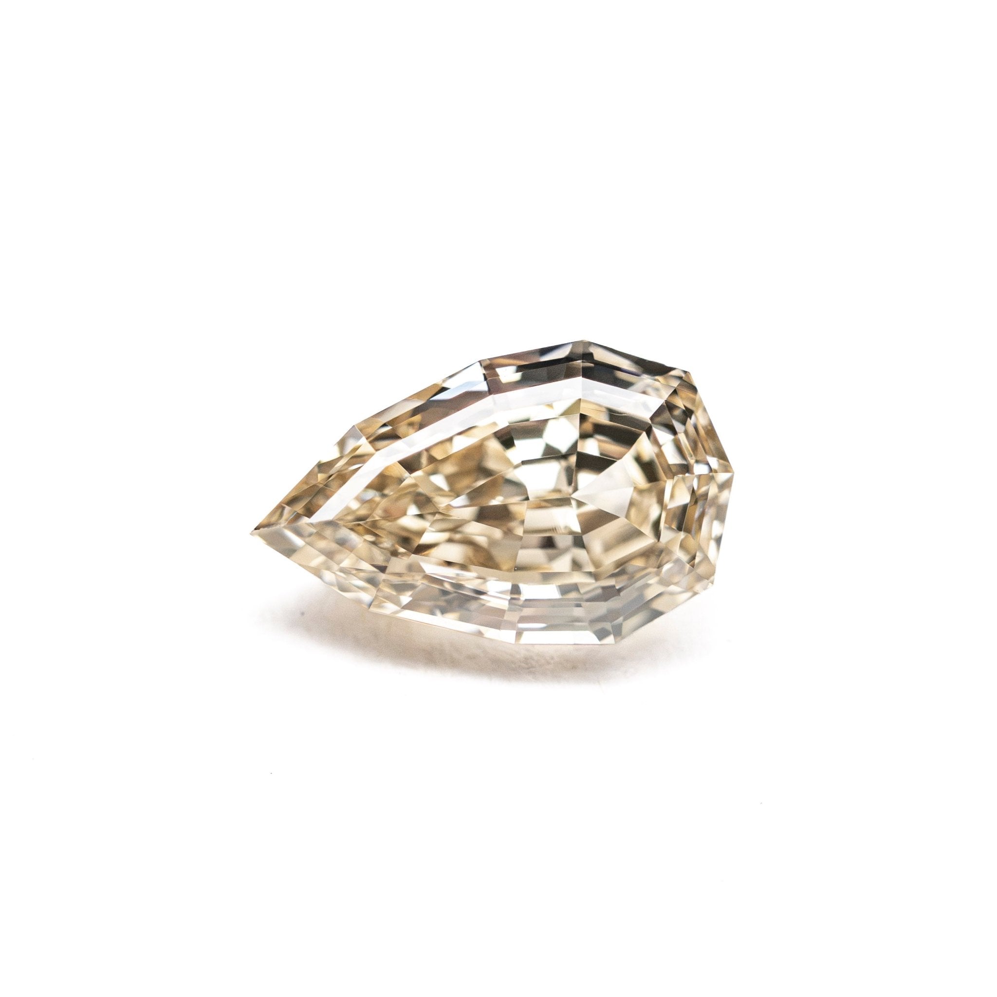 1.05ct 8.25x5.15x3.51mm VS2 Fancy Yellowish Brown Geo Pear Step Cut 28055-01 - MTD