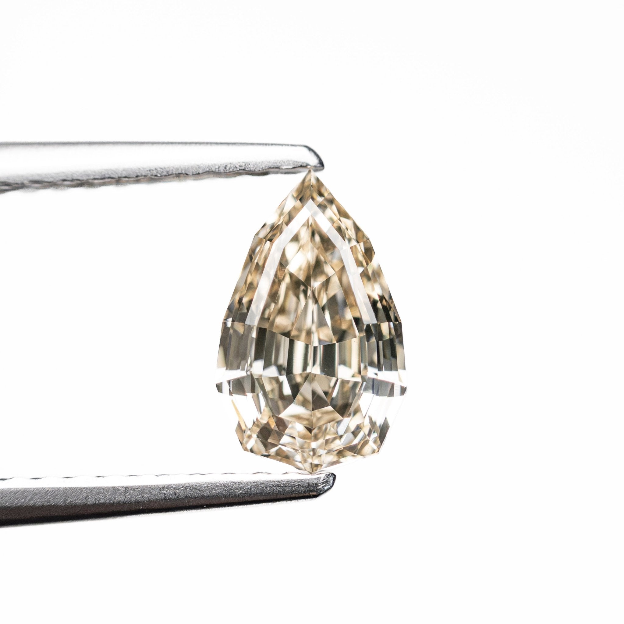 1.05ct 8.25x5.15x3.51mm VS2 Fancy Yellowish Brown Geo Pear Step Cut 28055-01 - MTD
