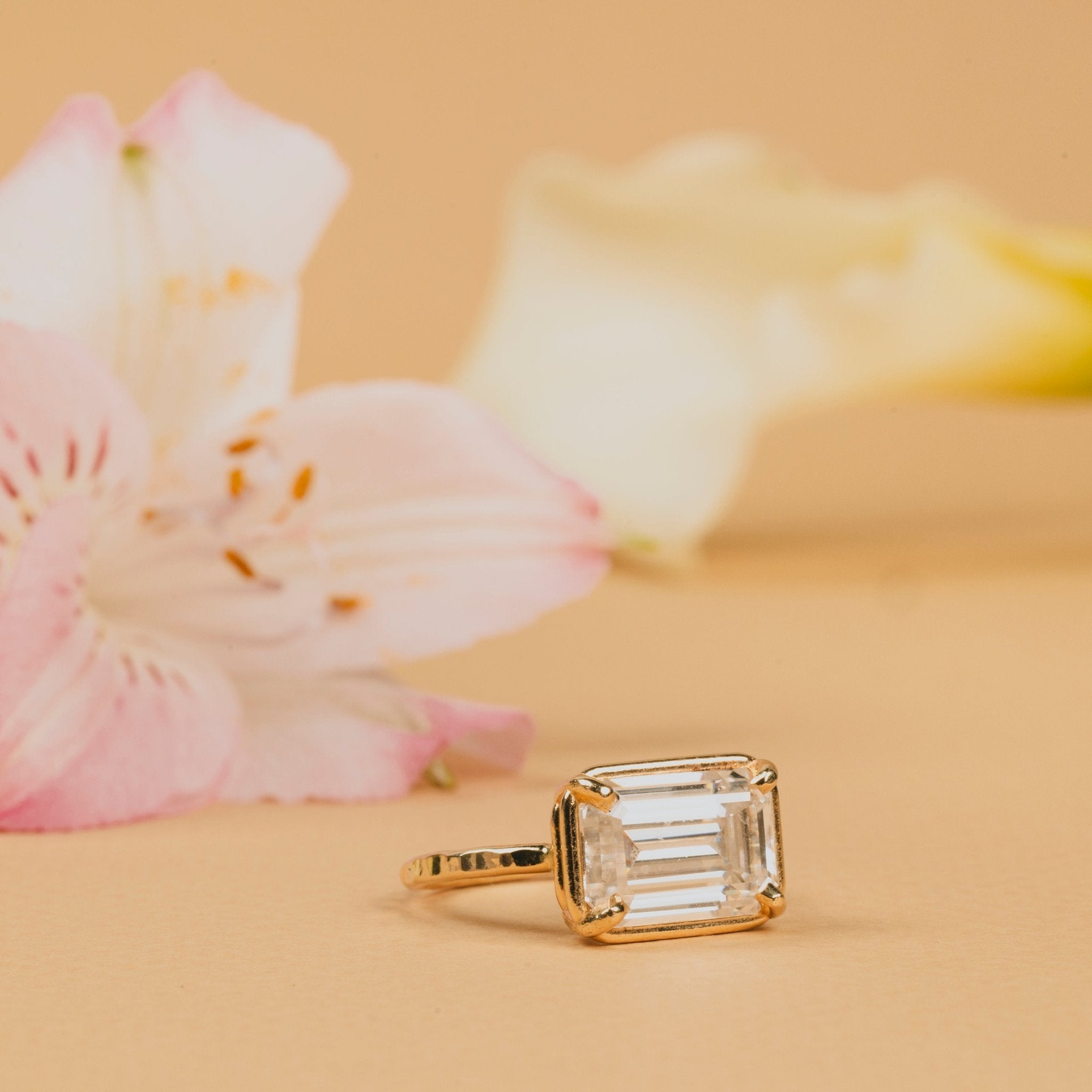 Diana East - West 5ct Emerald Cut Gold Halo Engagement Ring with Hammered Band - MTD
