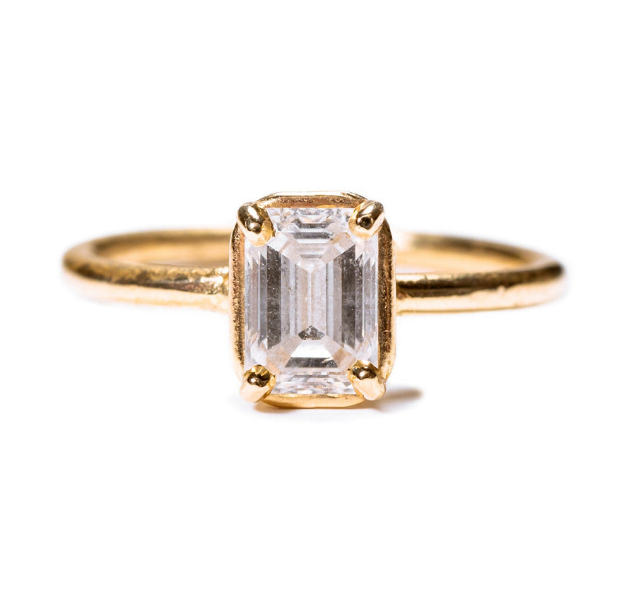 Emerald Cut Diamond In Golden Halo Setting