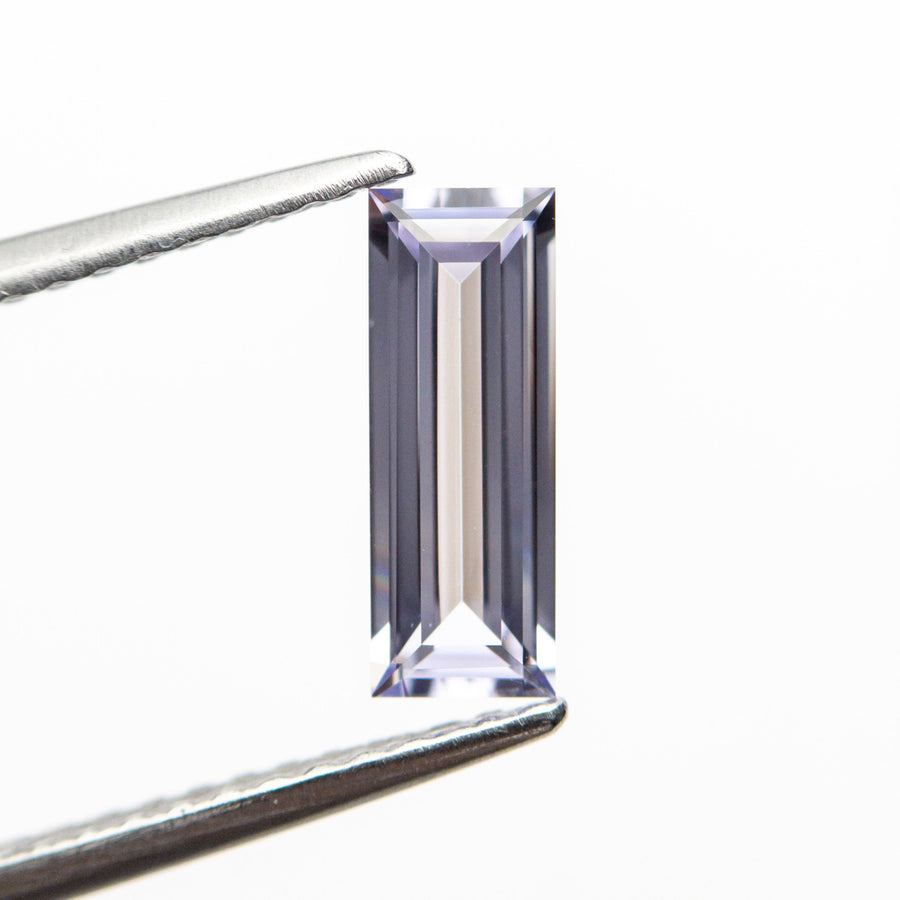 0.71ct 9.01x3.28x2.08mm Rectangle Step Cut Sapphire 22877-01 - MTD