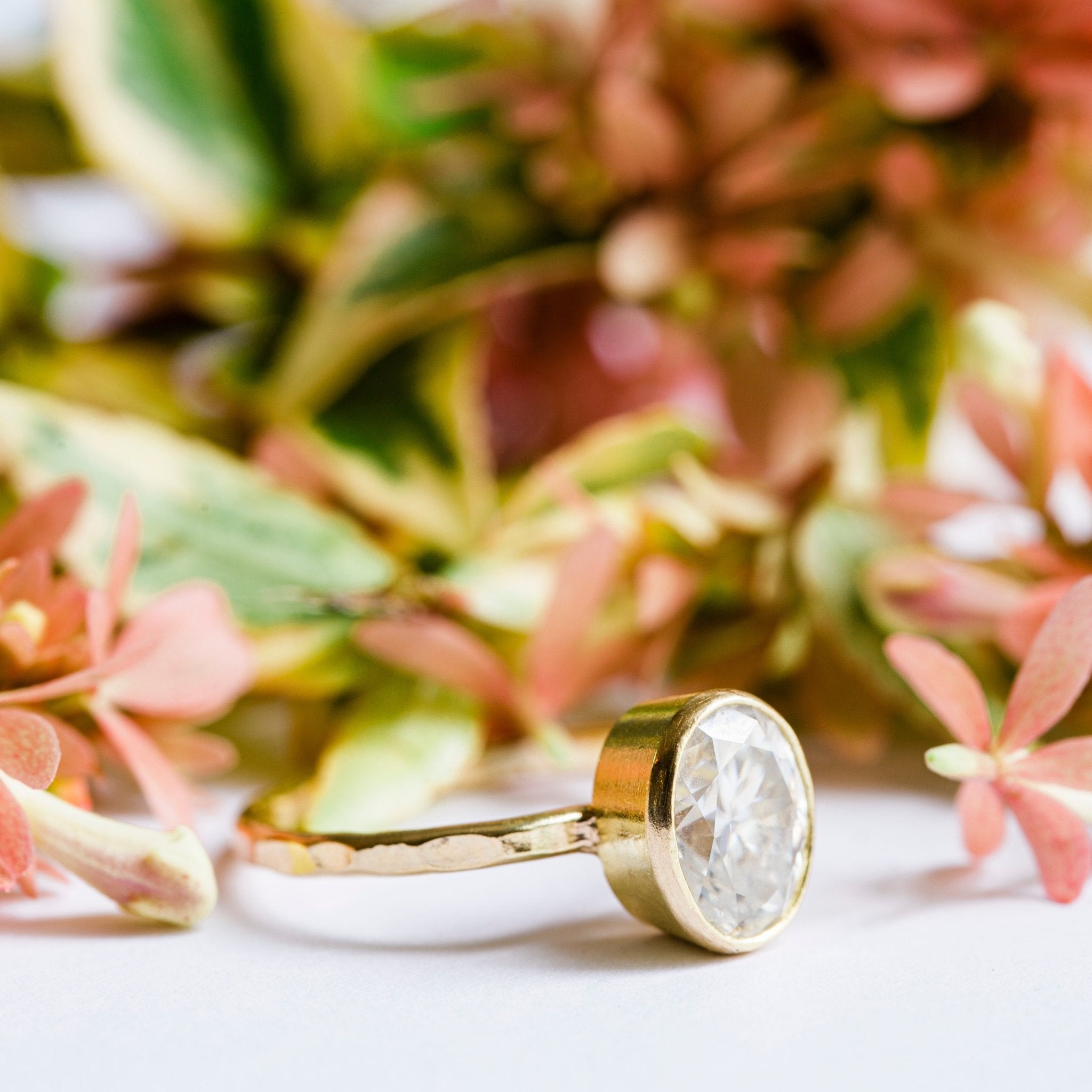 Katrina Oval Moissanite Engagement Ring | Bezel Set Oval Moissanite Engagement Ring Hammered 18k Gold - MTD