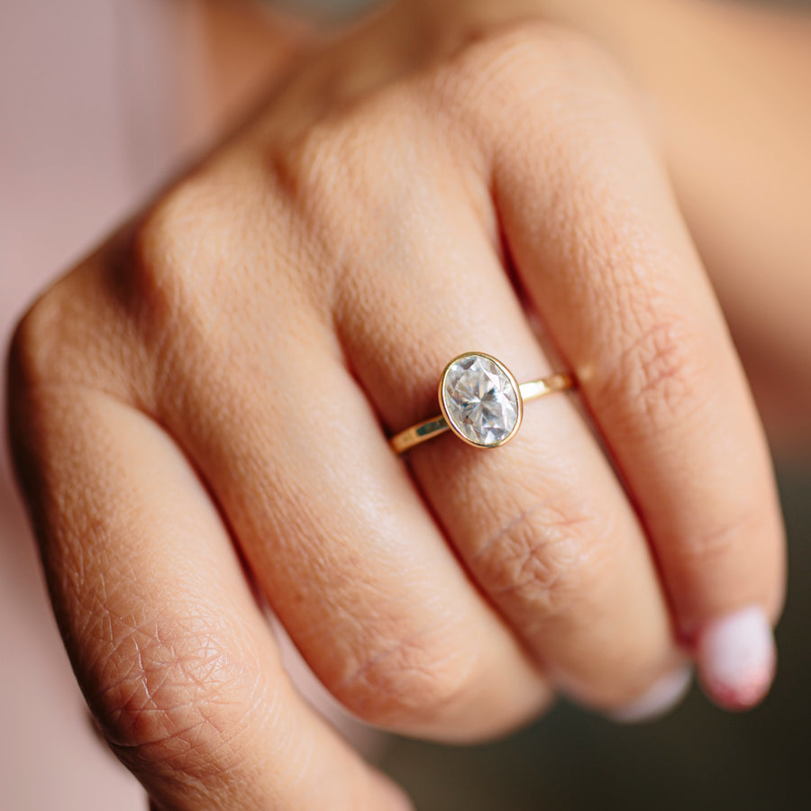 Katrina Oval Moissanite Engagement Ring | Bezel Set Oval Moissanite Engagement Ring Hammered 18k Gold - Melissa Tyson Designs